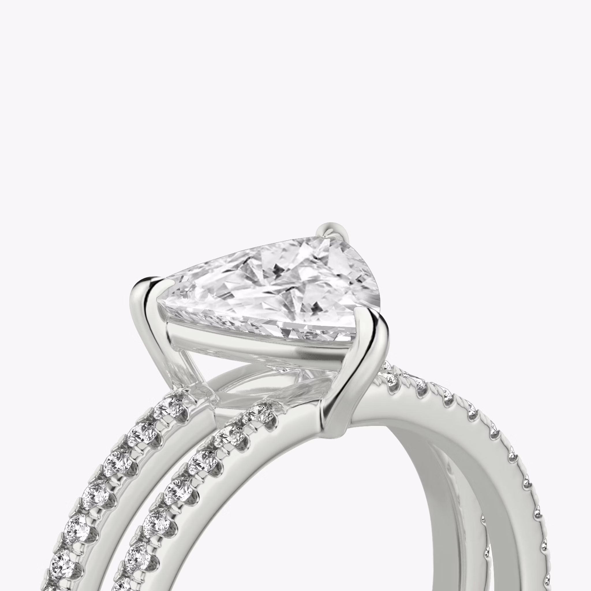 The Double Band | Trillion | Platinum | bandAccent: Pavé | bandStoneShape: Round Brilliant | diamondOrientation: vertical | caratWeight: other