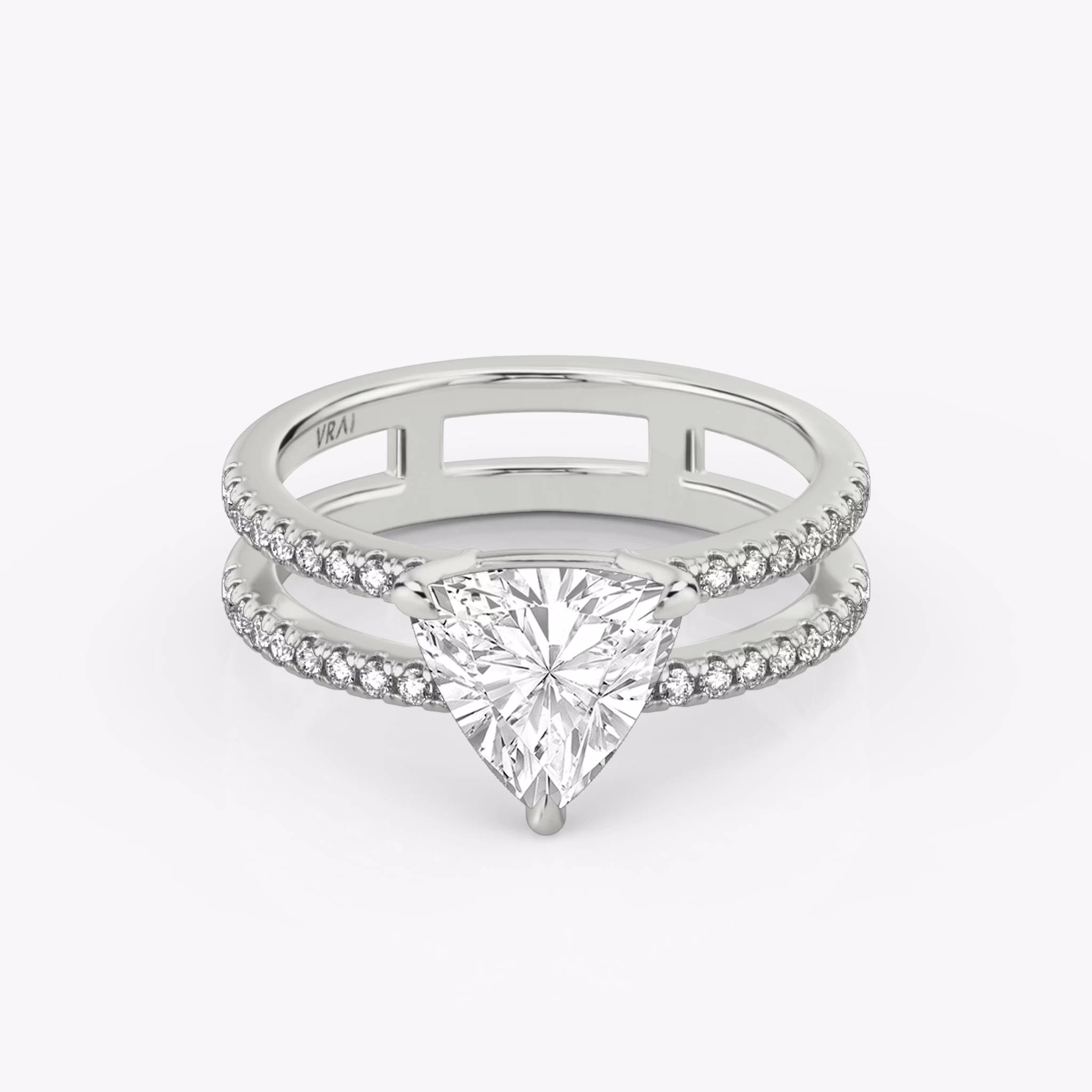 The Double Band | Trillion | Platinum | bandAccent: Pavé | bandStoneShape: Round Brilliant | diamondOrientation: vertical | caratWeight: other
