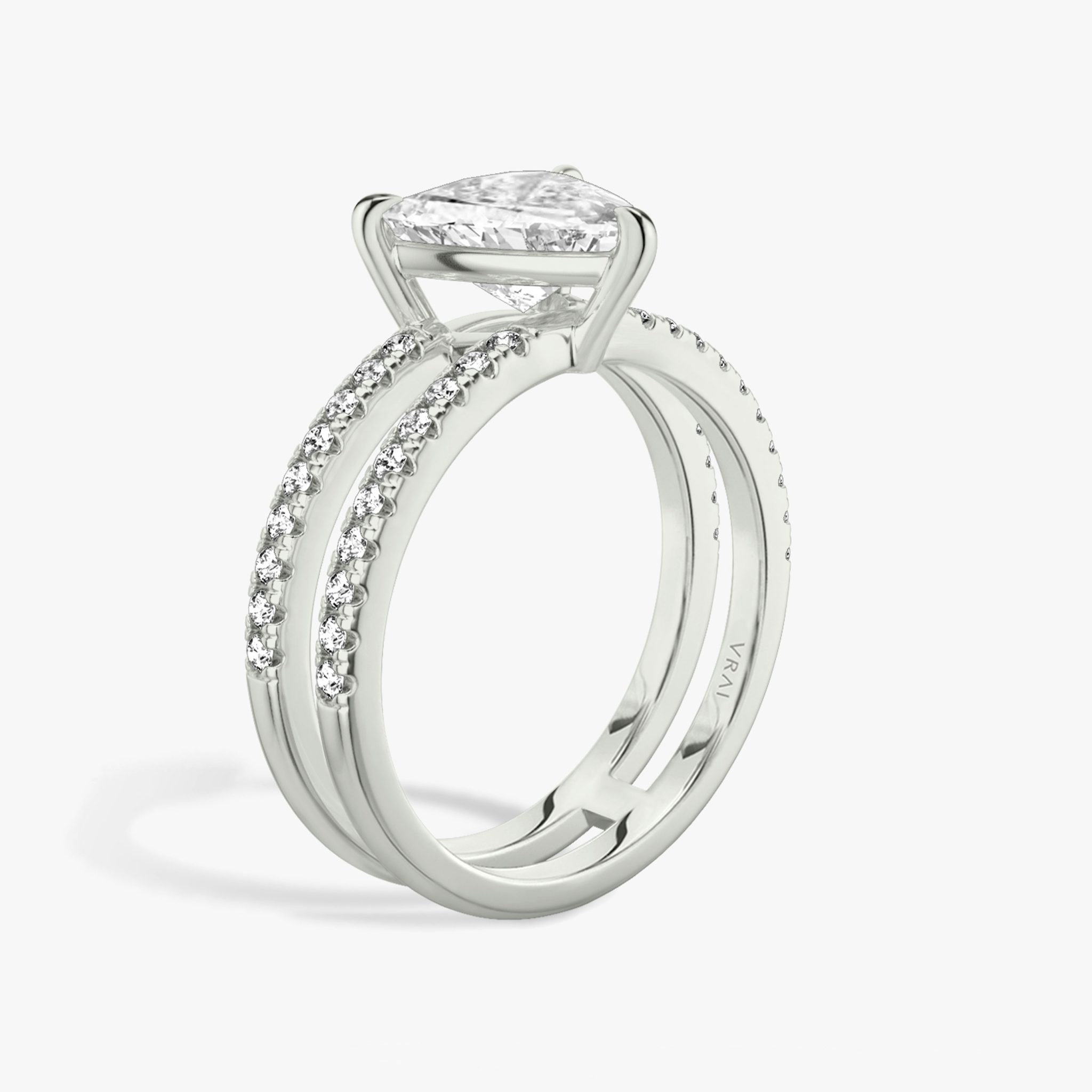 The Double Band | Trillion | Platinum | bandAccent: Pavé | bandStoneShape: Round Brilliant | diamondOrientation: vertical | caratWeight: other
