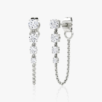 A pair of white gold Linked Tennis Earrings.