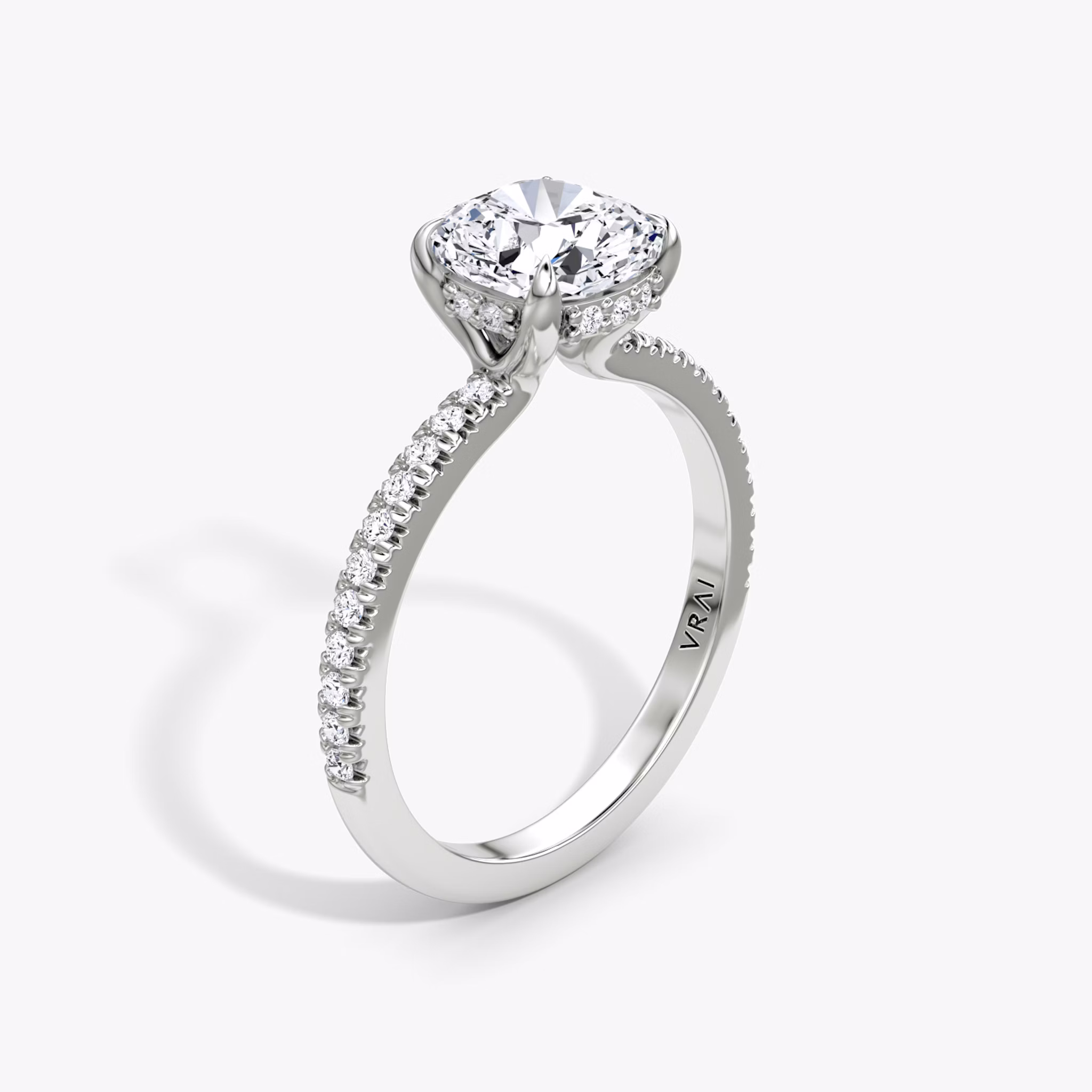 The Floating Solitaire | Cushion | Platinum | bandAccent: Pavé | diamondOrientation: vertical | caratWeight: other