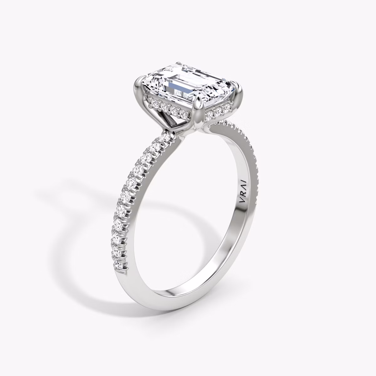 The Floating Solitaire | Emerald | 18k | White Gold | bandAccent: Pavé | diamondOrientation: vertical | caratWeight: other