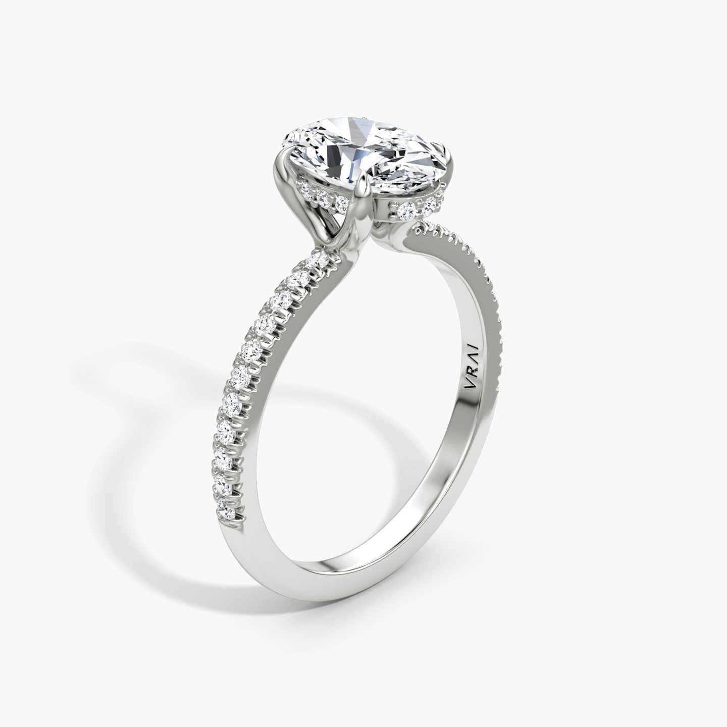 The Floating Solitaire | Oval | 18k | White Gold | bandAccent: Pavé | diamondOrientation: vertical | caratWeight: other