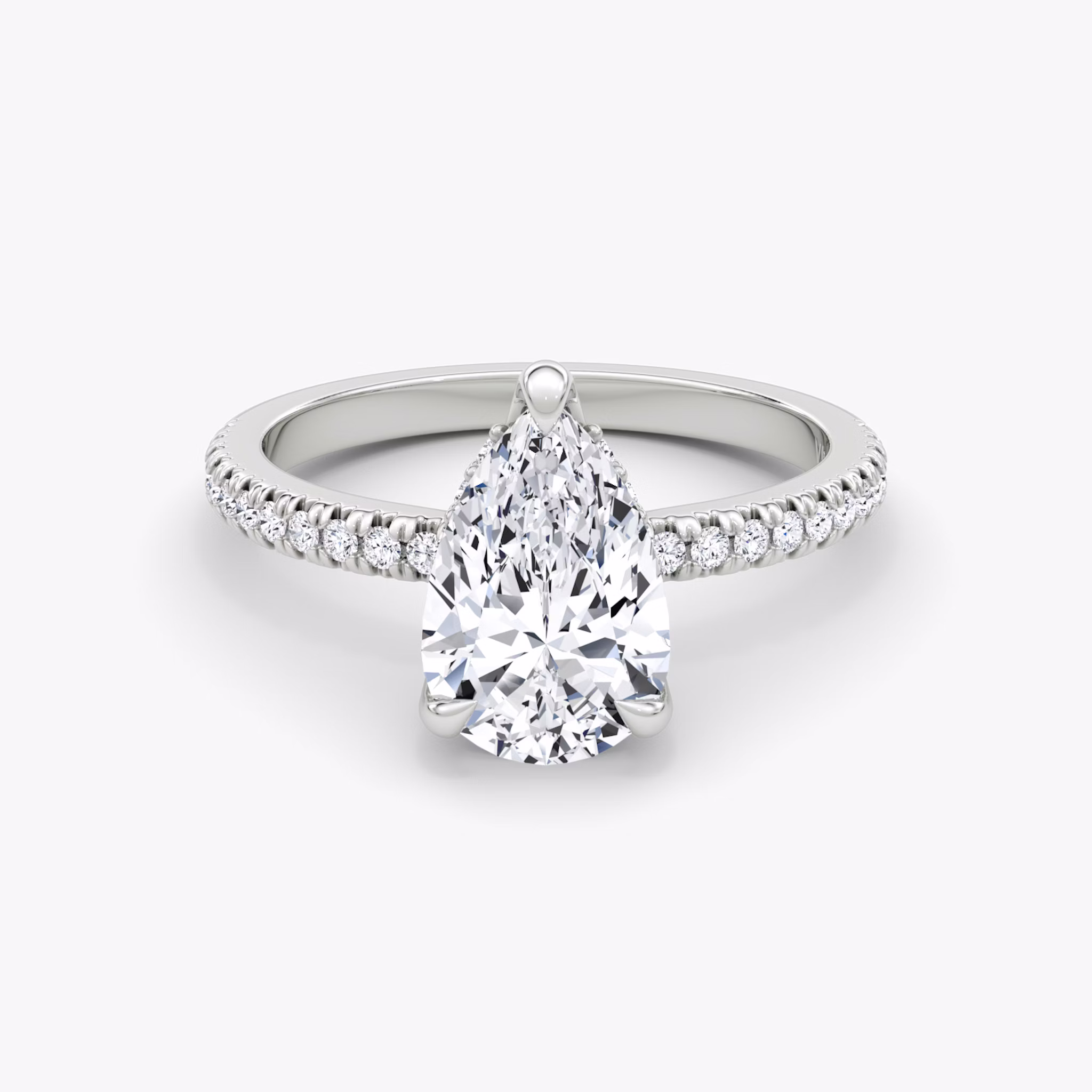 The Floating Solitaire | Pear | Platinum | bandAccent: Pavé | diamondOrientation: vertical | caratWeight: other