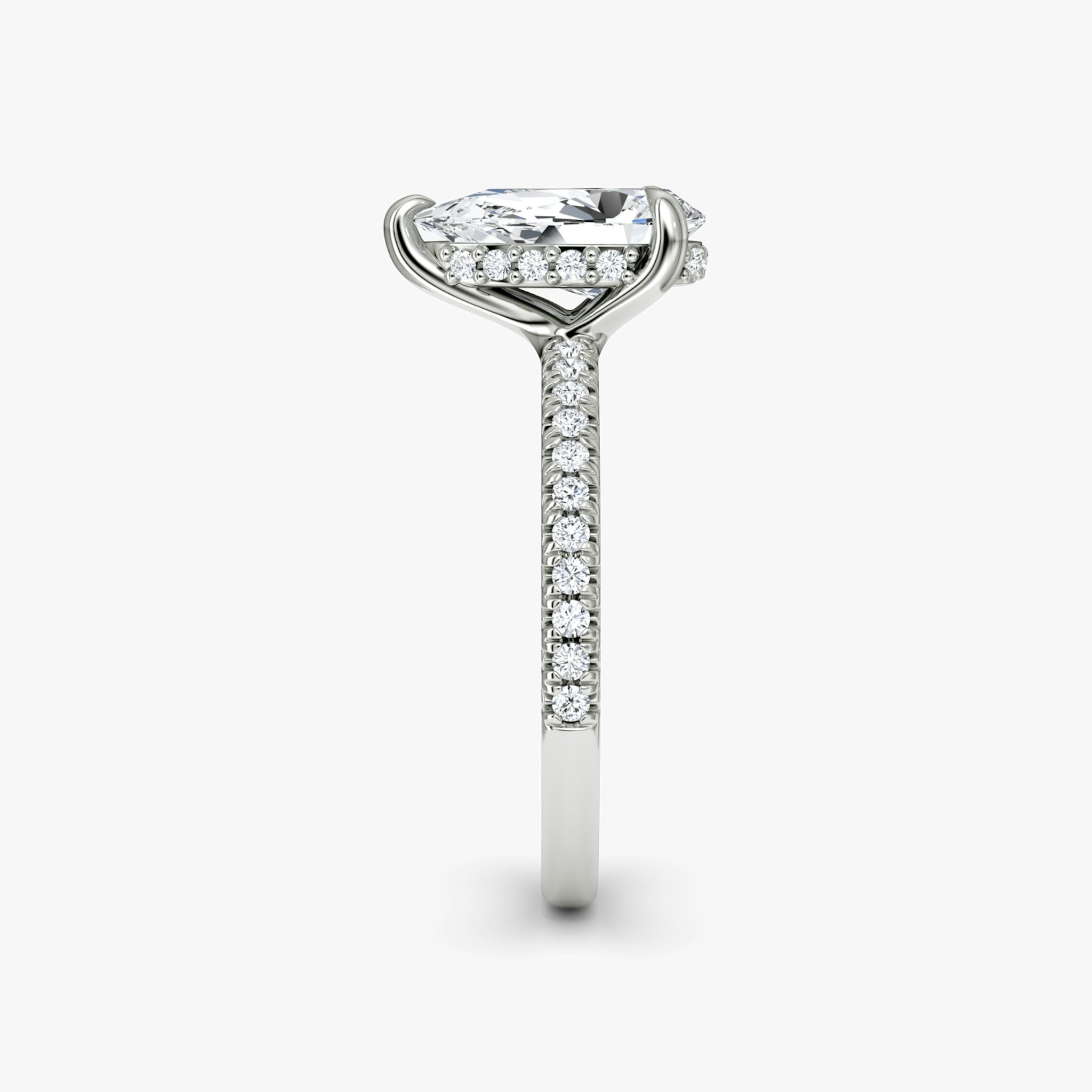 The Floating Solitaire | Pear | Platinum | bandAccent: Pavé | diamondOrientation: vertical | caratWeight: other