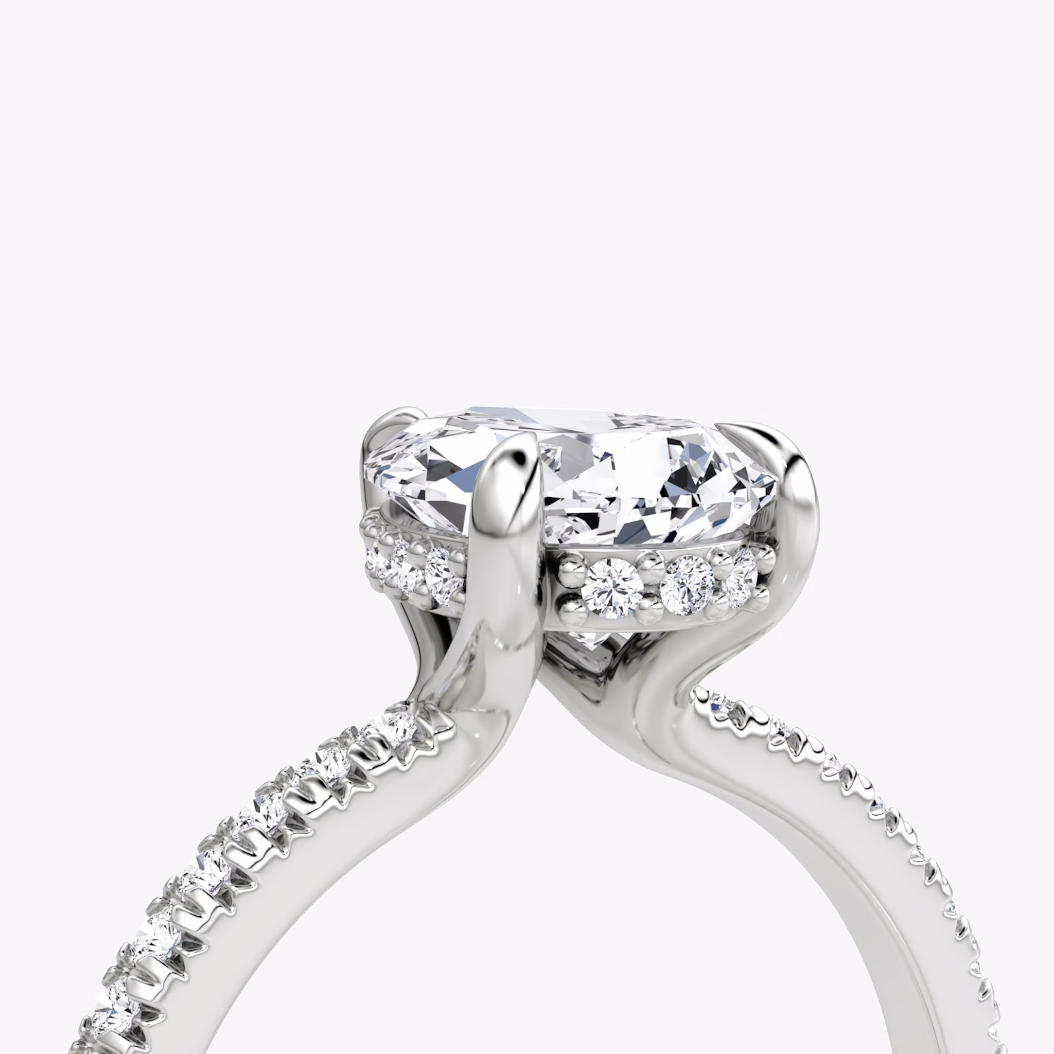 The Floating Solitaire | Pear | Platinum | bandAccent: Pavé | diamondOrientation: vertical | caratWeight: other