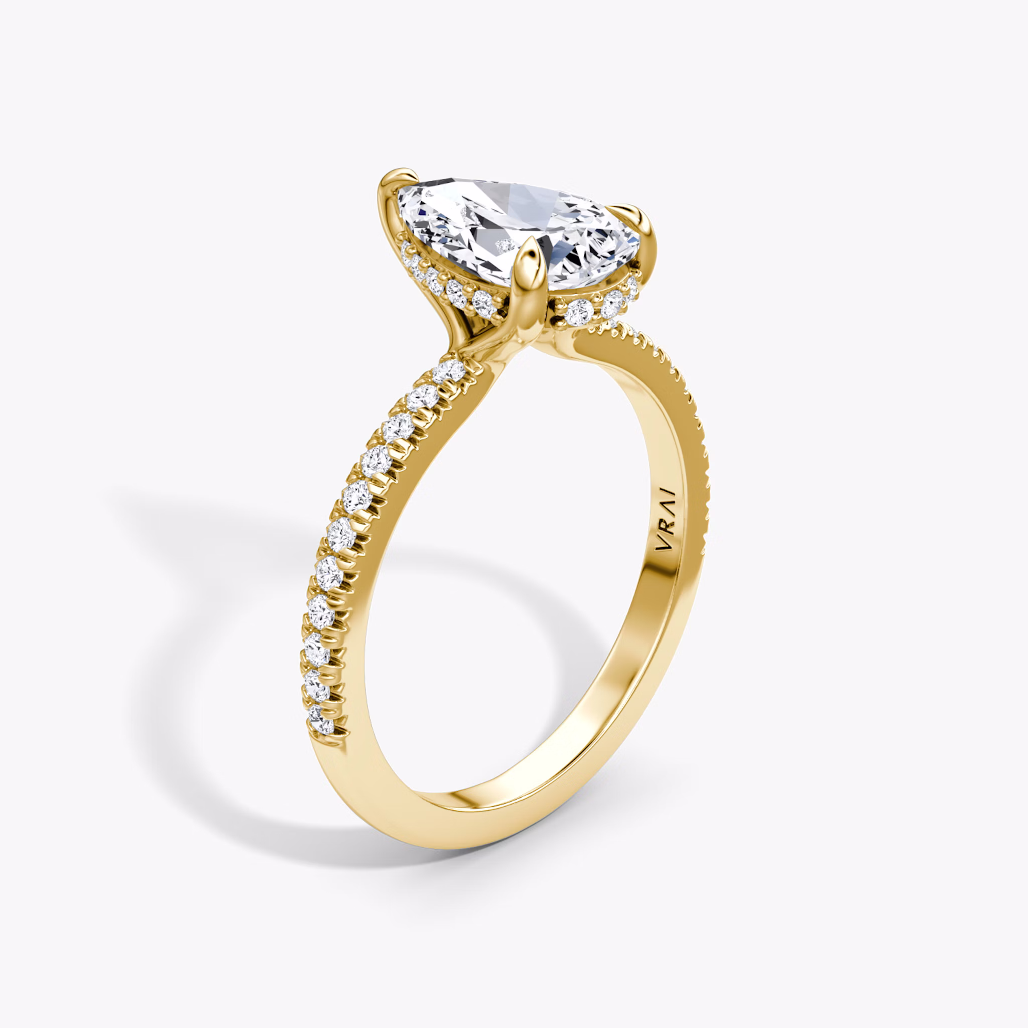 The Floating Solitaire | Pear | 18k | Yellow Gold | bandAccent: Pavé | diamondOrientation: vertical | caratWeight: other