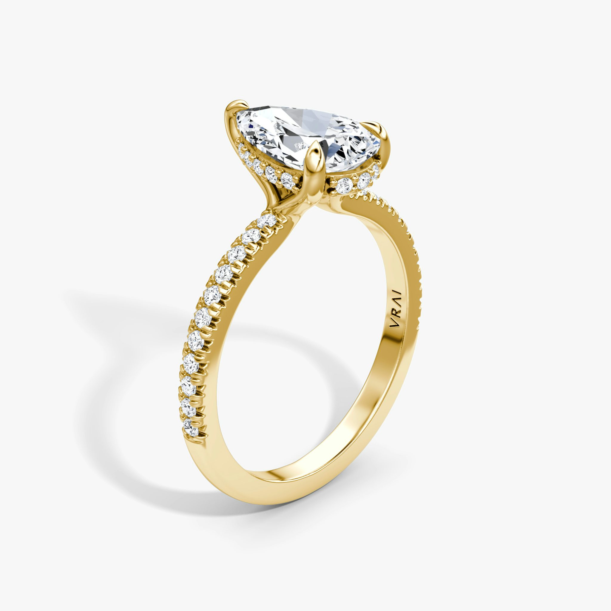 The Floating Solitaire | Pear | 18k | Yellow Gold | bandAccent: Pavé | diamondOrientation: vertical | caratWeight: other