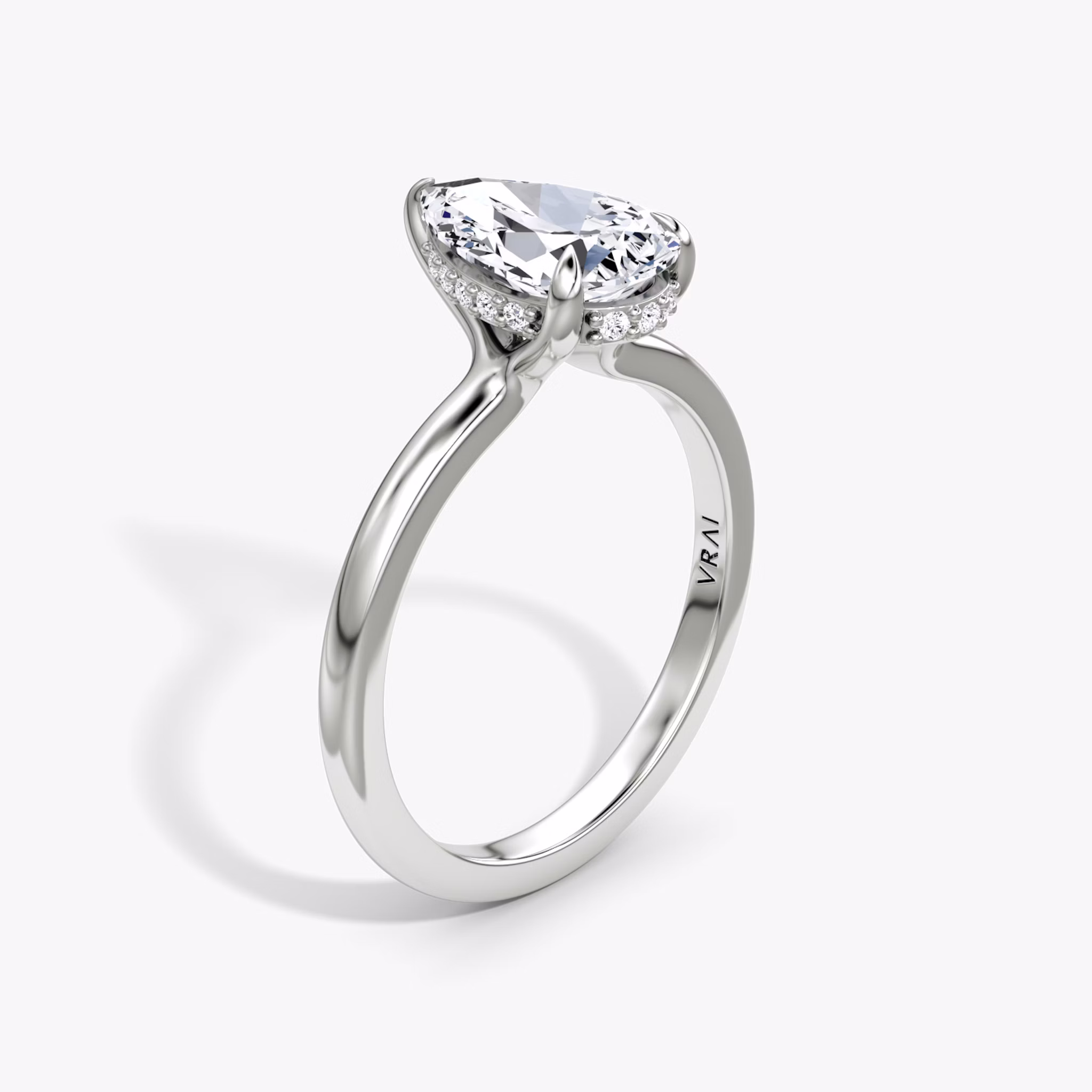 The Floating Solitaire | Pear | Platinum | bandAccent: Plain | diamondOrientation: vertical | caratWeight: other