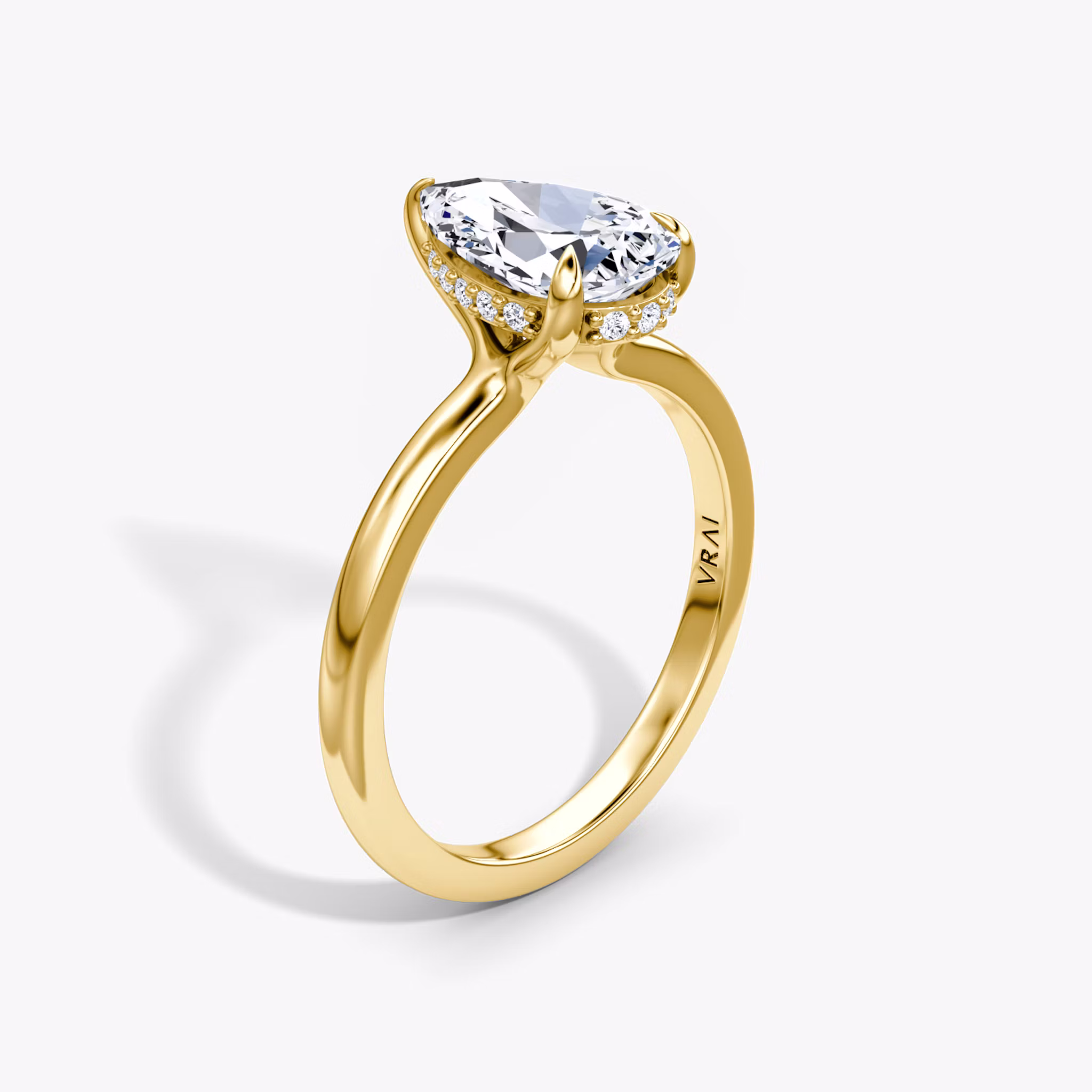 Floating Solitaire Pear | Yellow Gold