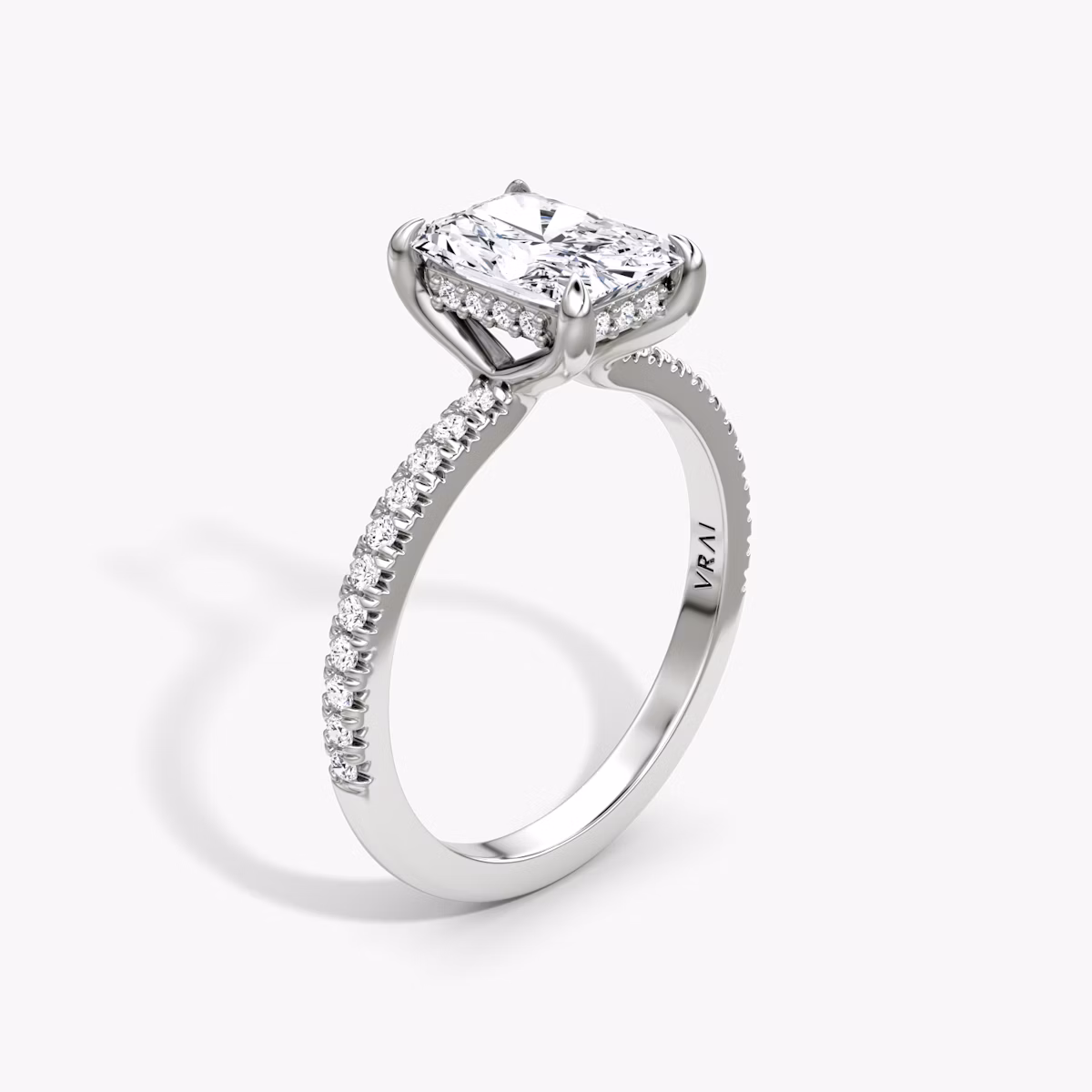 The Floating Solitaire | Radiant | 18k | White Gold | bandAccent: Pavé | diamondOrientation: vertical | caratWeight: other