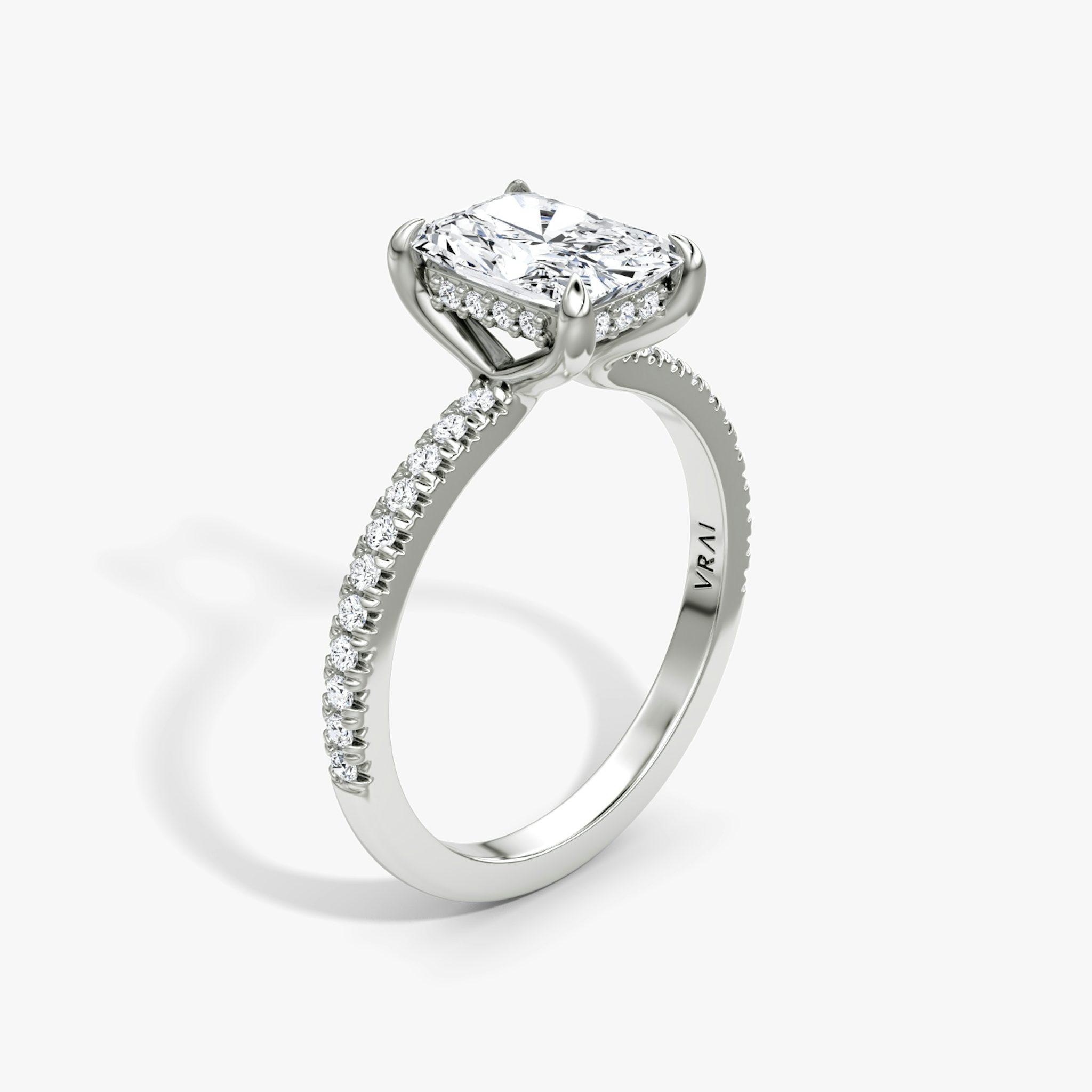 The Floating Solitaire | Radiant | Platinum | bandAccent: Pavé | diamondOrientation: vertical | caratWeight: other