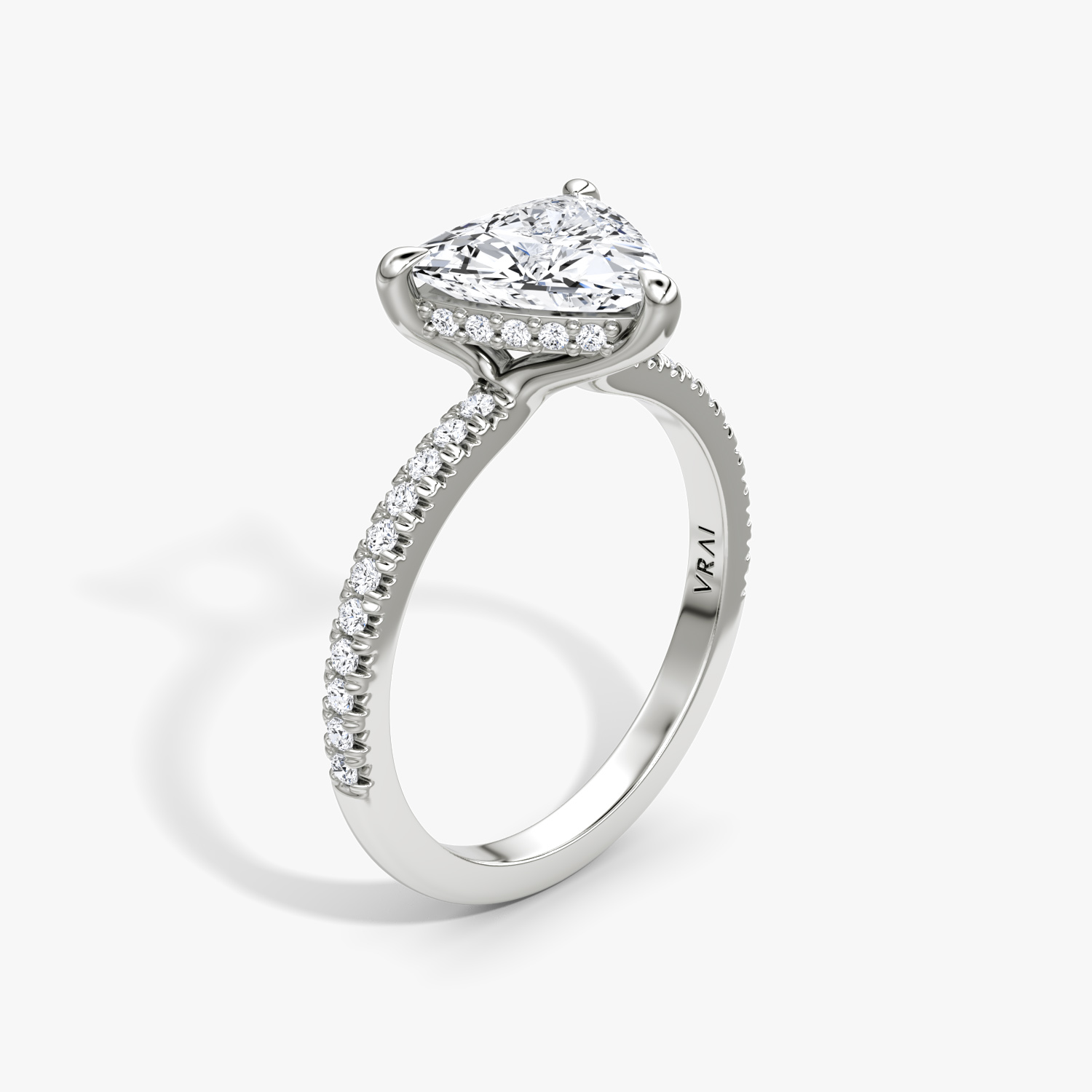 The Floating Solitaire Trillion Engagement Ring | Pavé Band | Platinum