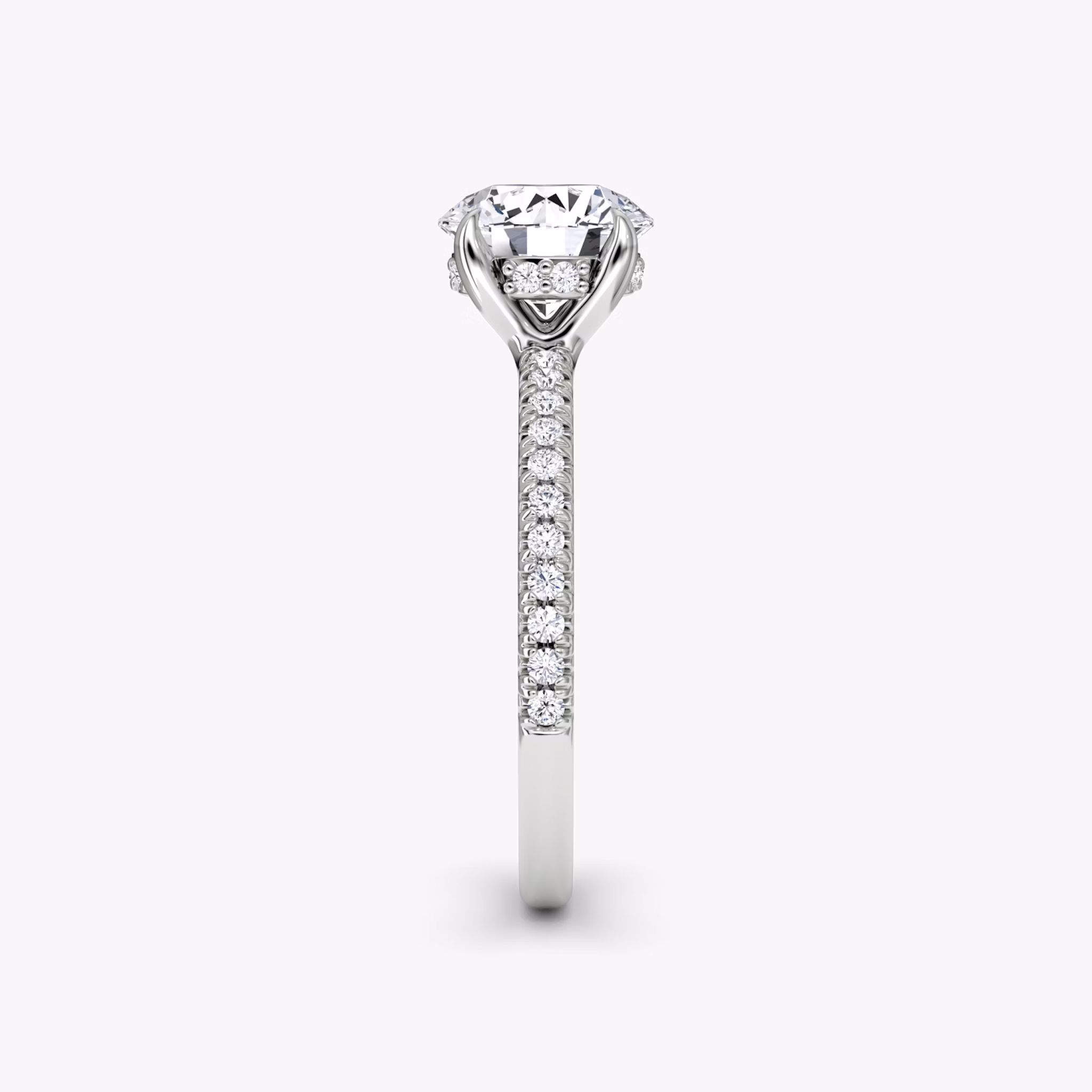 The Floating Solitaire | Round Brilliant | Platinum | bandAccent: Pavé | caratWeight: other | diamondOrientation: vertical
