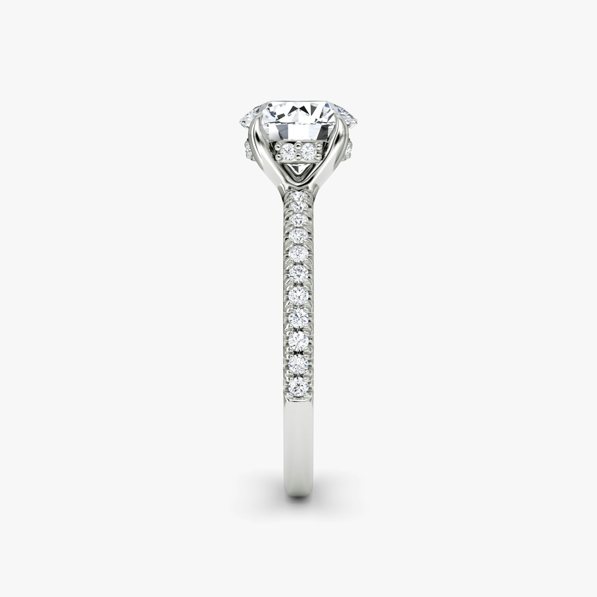 The Floating Solitaire | Round Brilliant | Platinum | bandAccent: Pavé | caratWeight: other | diamondOrientation: vertical