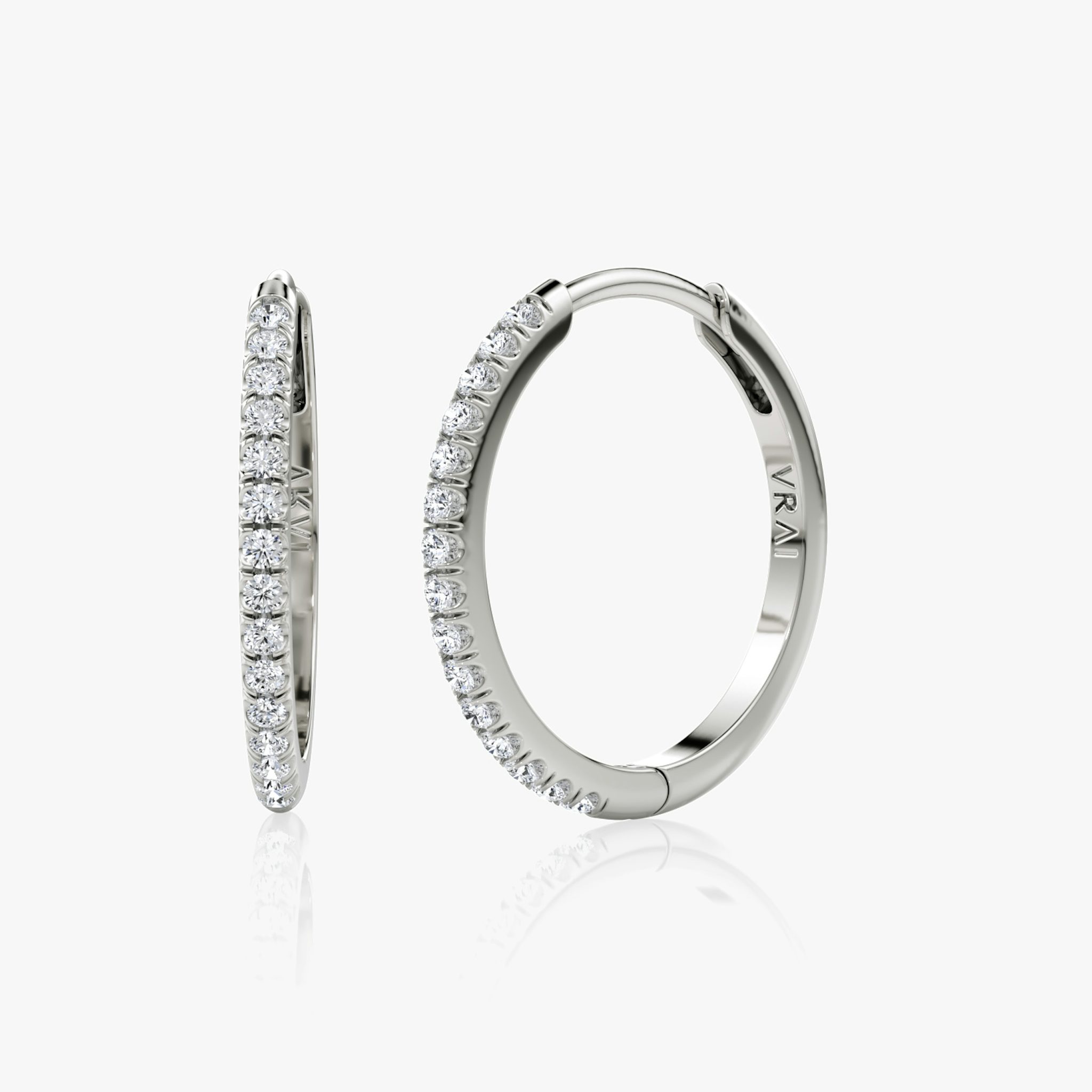 A pair of sterling silver or white gold Pavé Hoops.