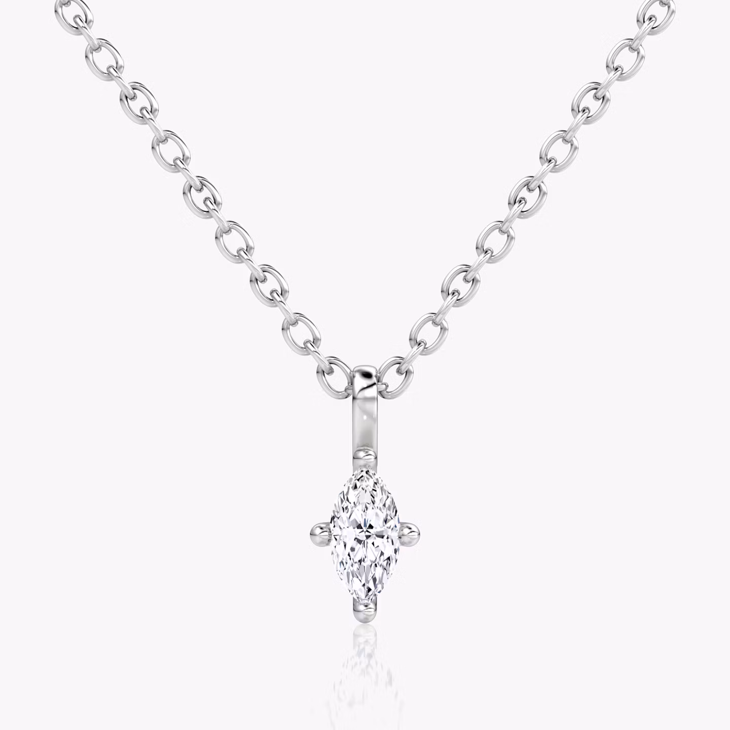 Solitaire marquise-cut diamond pendant in white gold on a fine chain, front view.