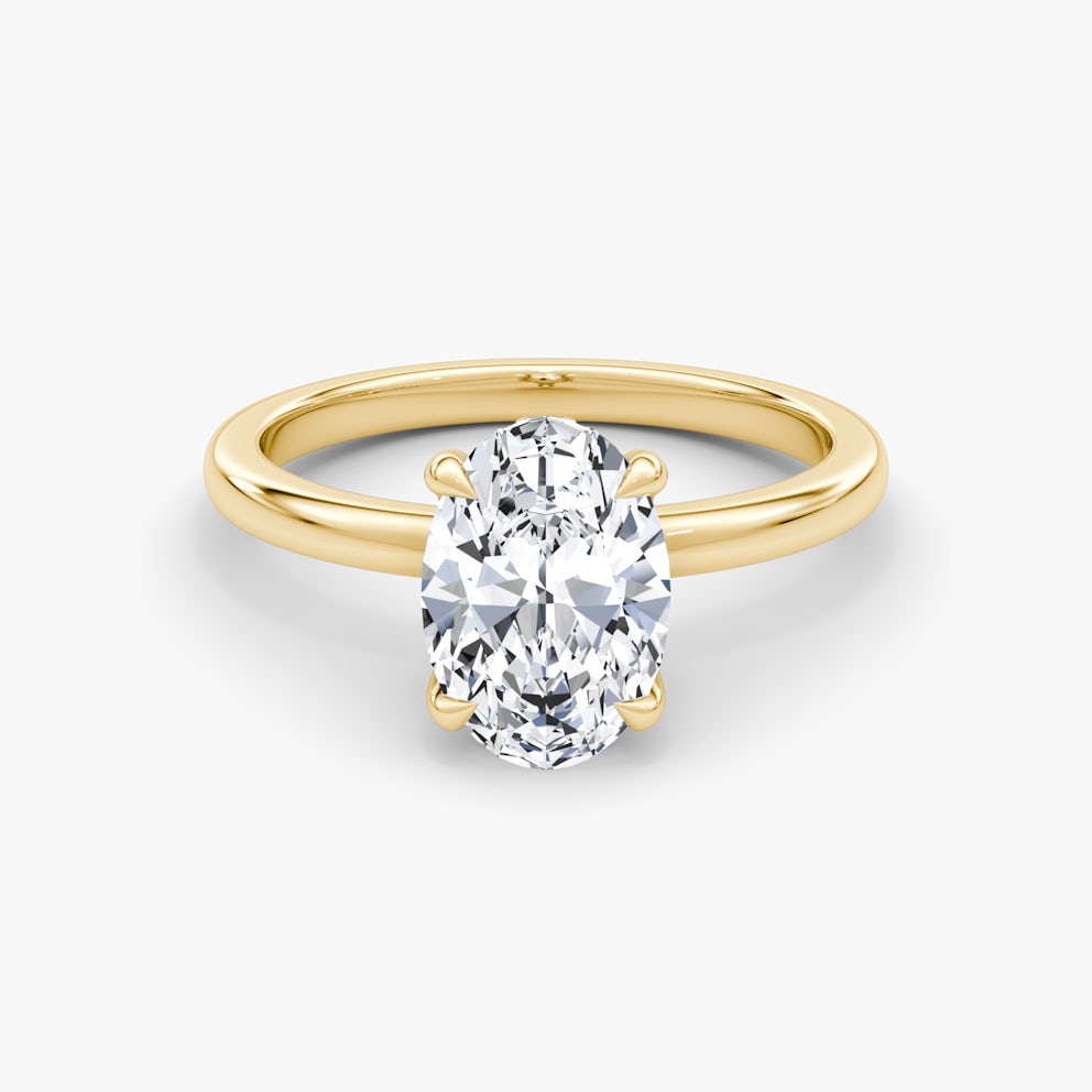 The Floating Solitaire Oval Engagement Ring | Plain Band | Yellow Gold