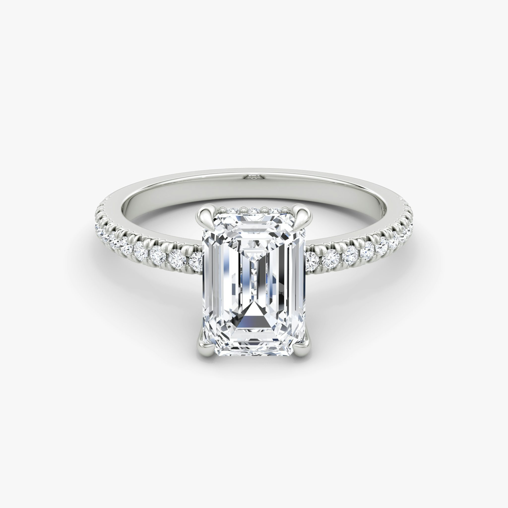 The Floating Solitaire | Emerald | Platinum | bandAccent: Pavé | diamondOrientation: vertical | caratWeight: other