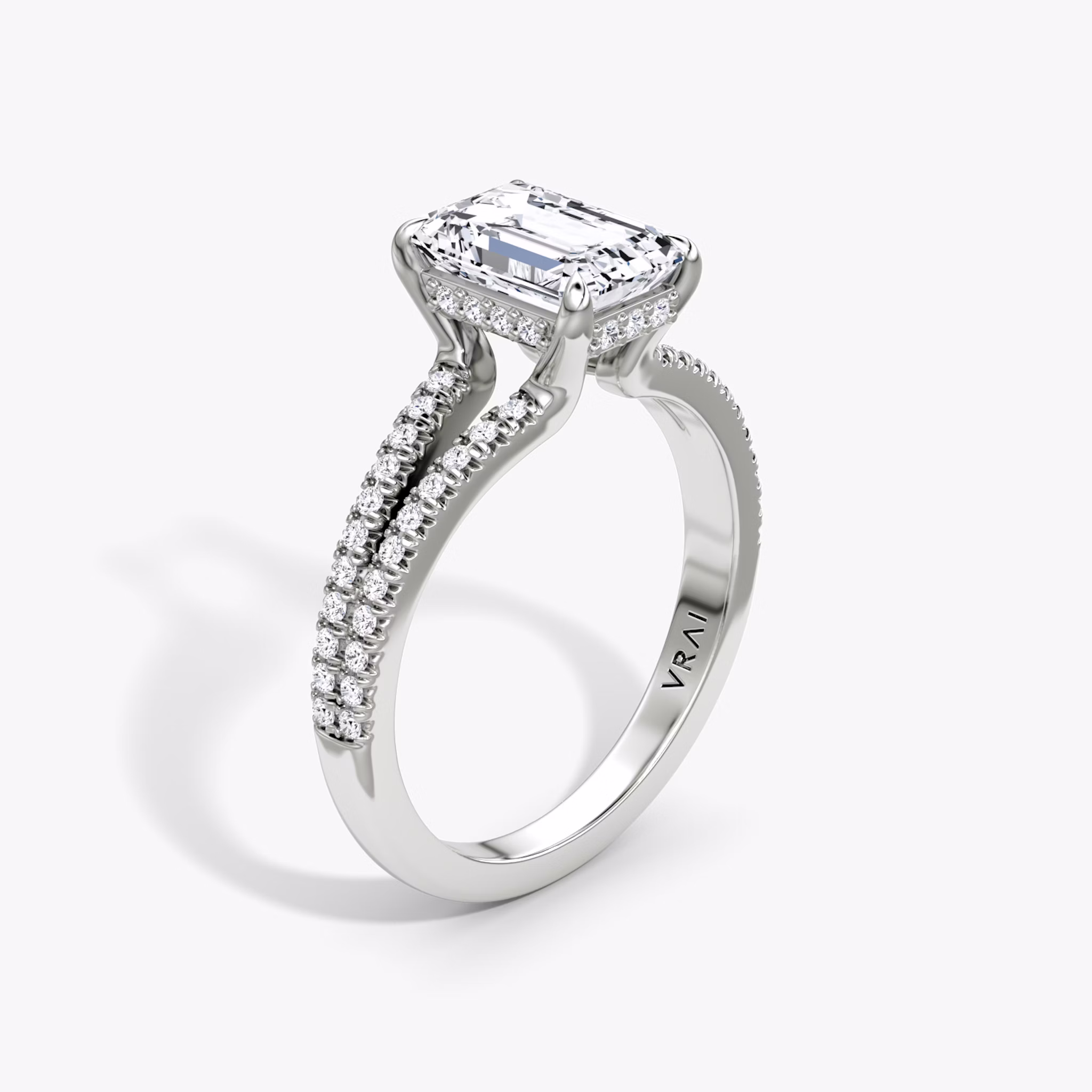 The Floating Split Band | Emerald | Platinum | bandAccent: Pavé | diamondOrientation: vertical | caratWeight: other