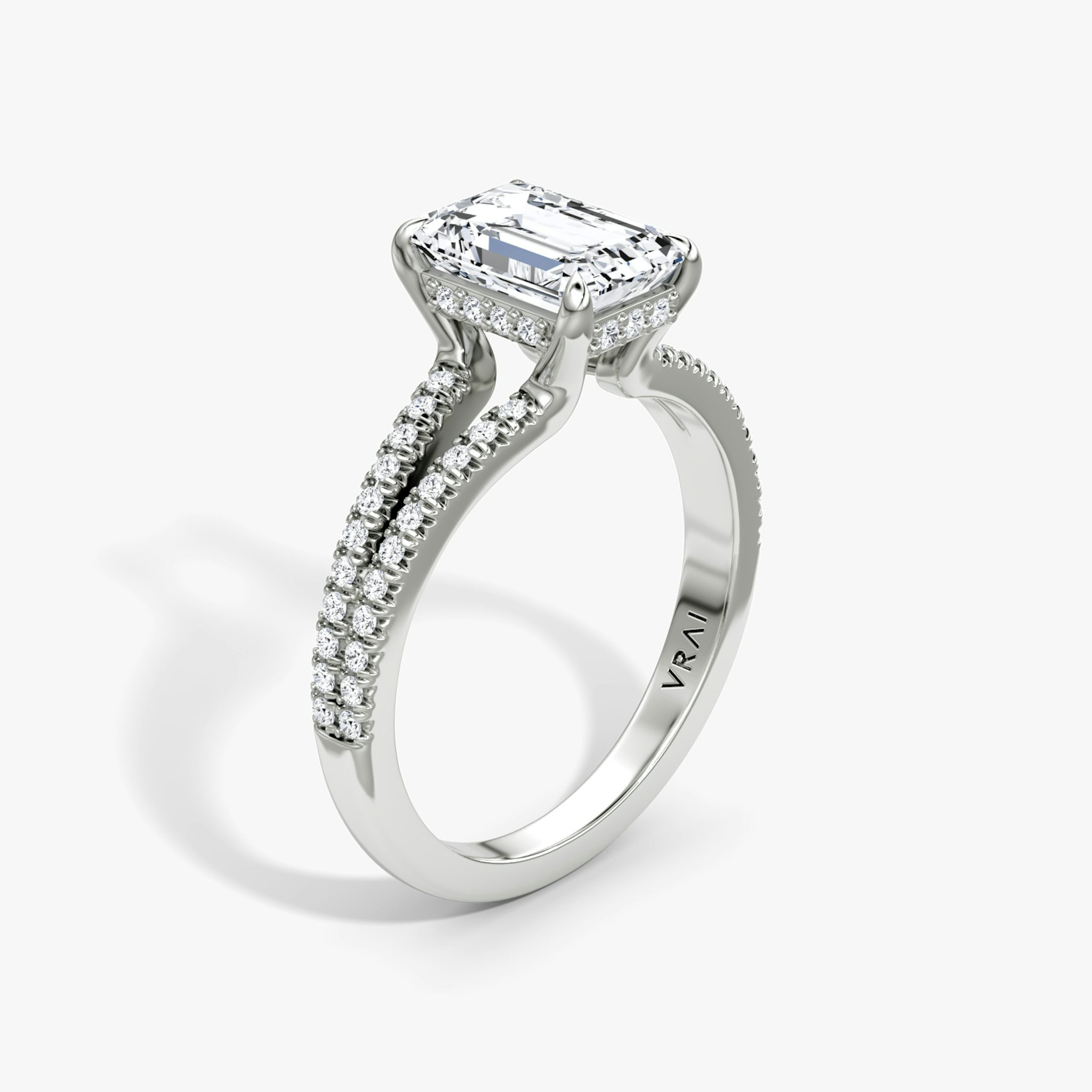 The Floating Split Band | Emerald | Platinum | bandAccent: Pavé | diamondOrientation: vertical | caratWeight: other