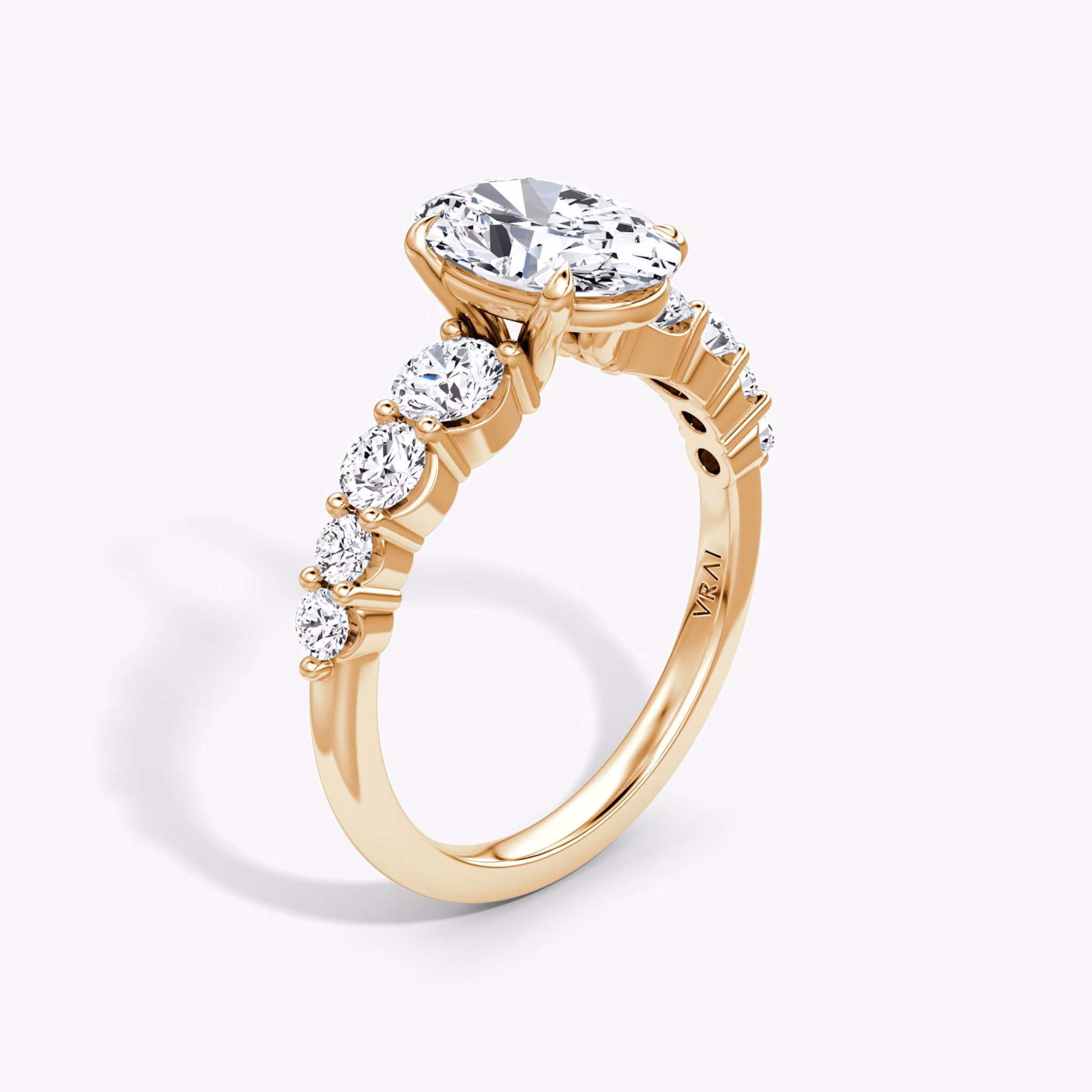 Anillo de compromiso Graduated | Oval | 14k | Oro rosa | bandAccent: Simple | diamondOrientation: vertical | caratWeight: other