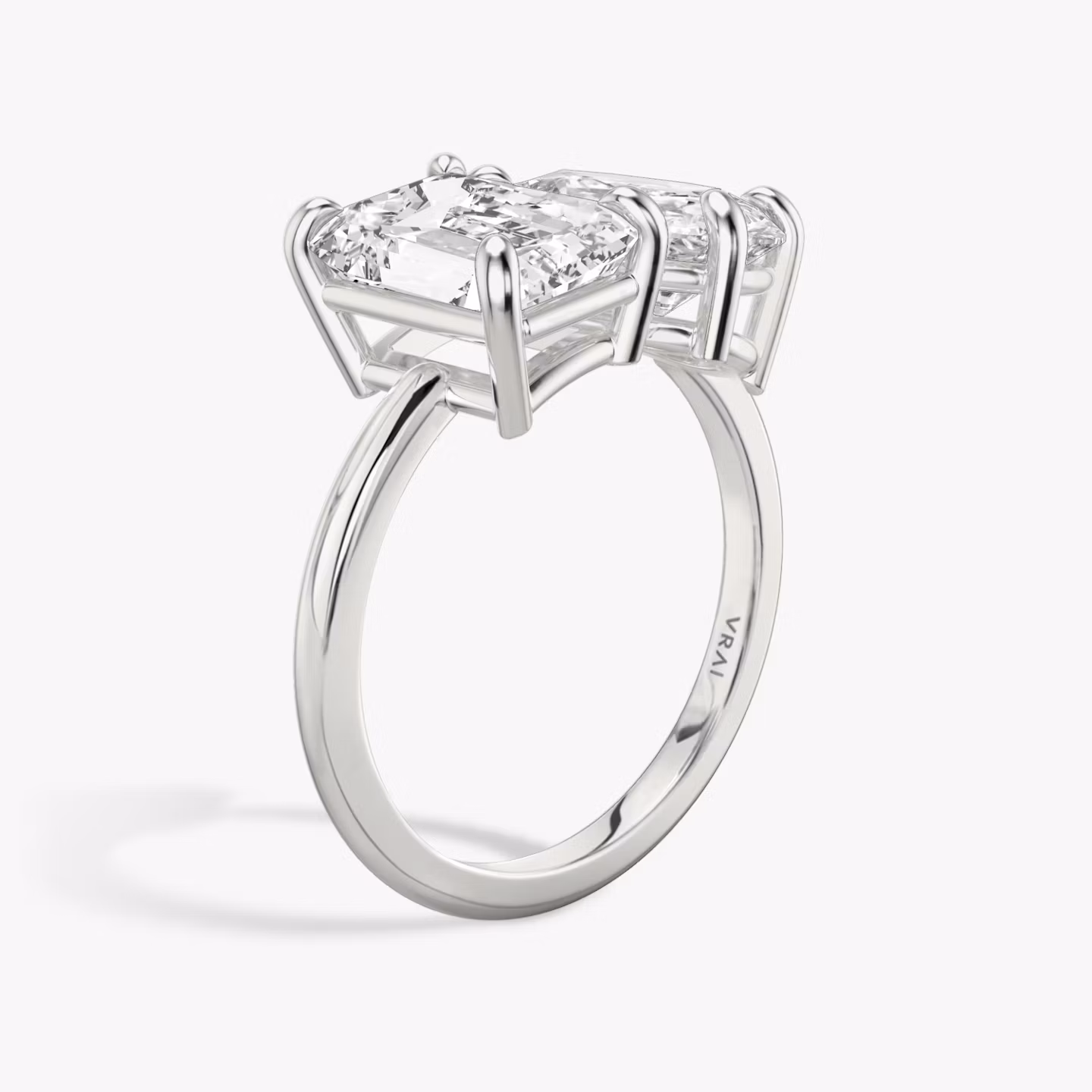 The Toi et Moi | Emerald and Pear | Platinum | bandAccent: Plain | diamondOrientation: vertical | caratWeight: other