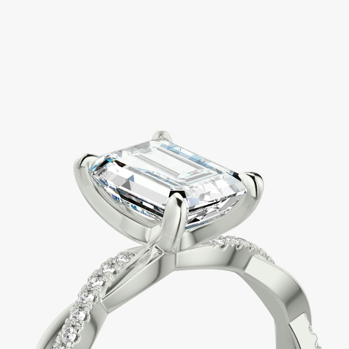 The Twisted Classic | Emerald | Platinum | bandAccent: Pavé | diamondOrientation: vertical | caratWeight: other