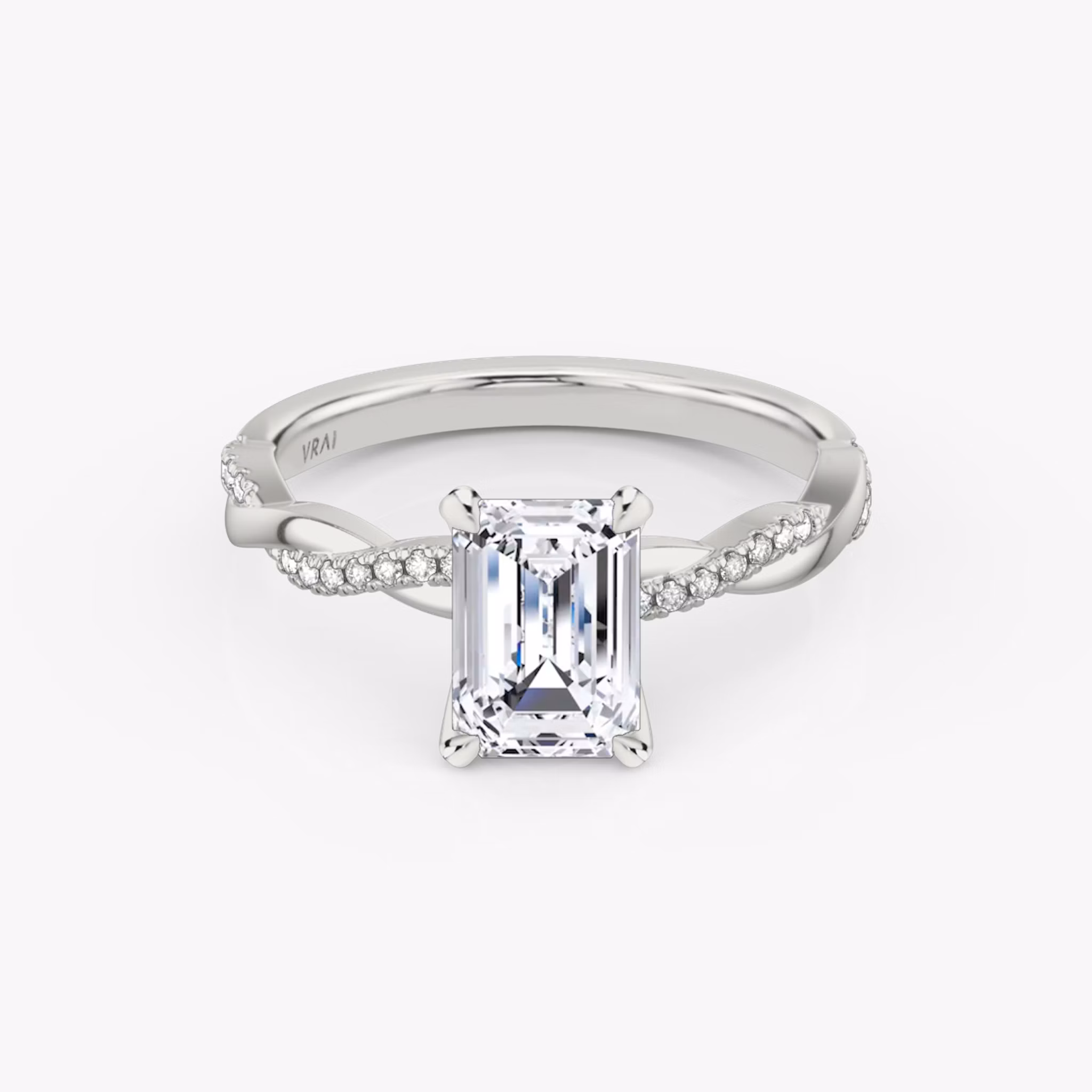 The Twisted Classic Emerald White Gold Engagement Ring.