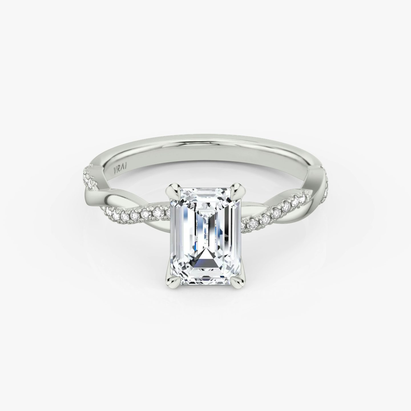 The Twisted Classic | Emerald | Platinum | bandAccent: Pavé | diamondOrientation: vertical | caratWeight: other