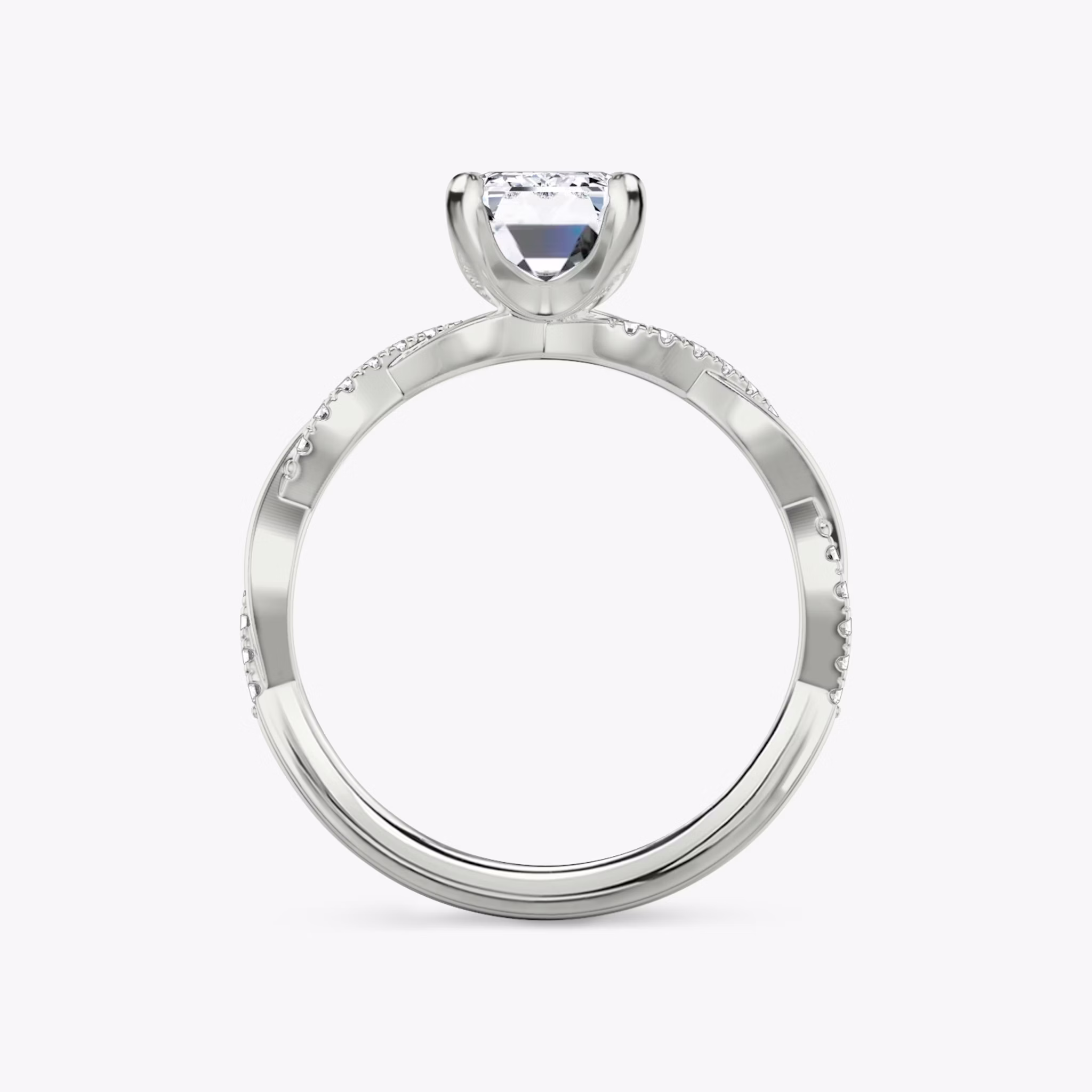 Anillo de compromiso Twisted Classic | Esmeralda | Platino | bandAccent: Pavé twisted | diamondOrientation: vertical | caratWeight: other