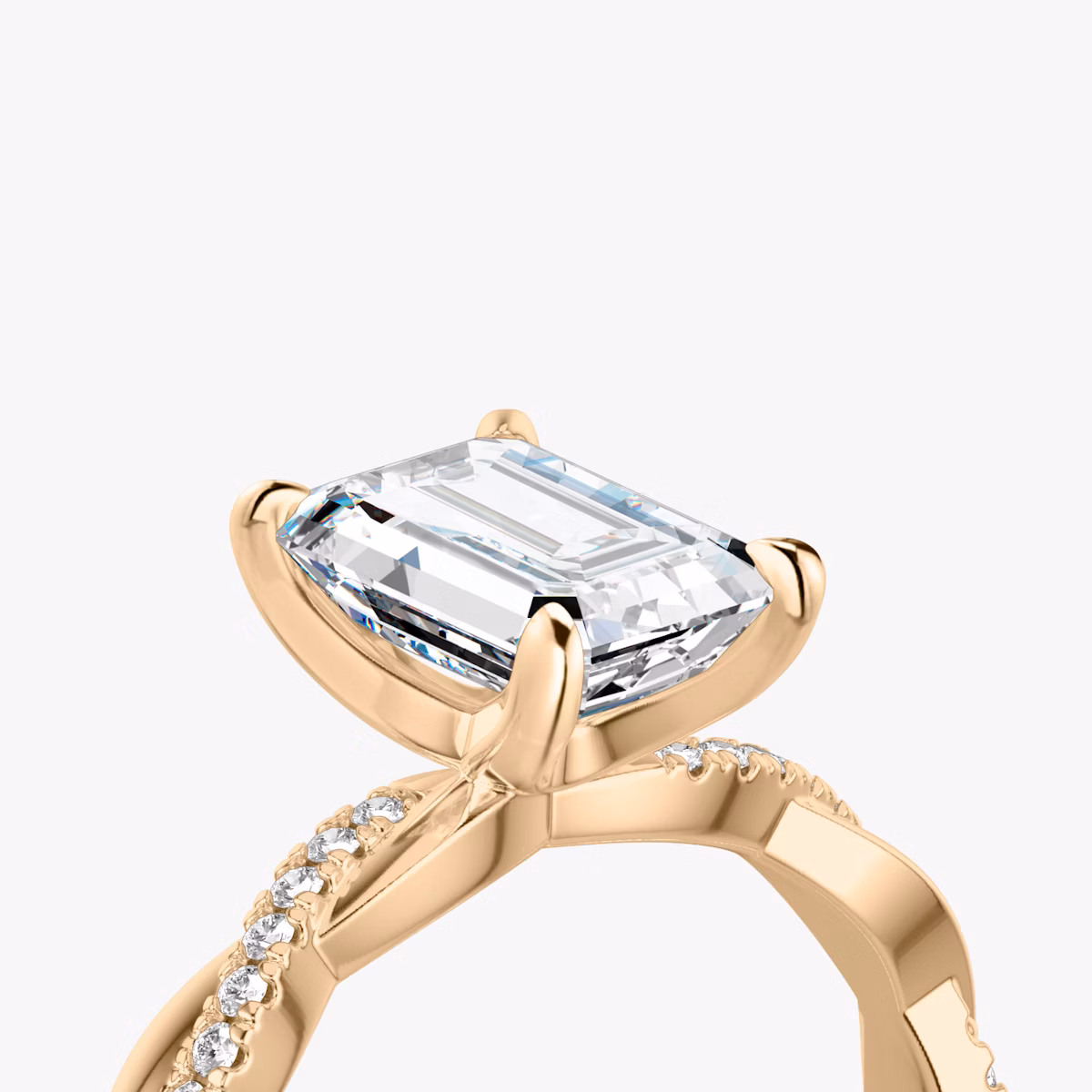 The Twisted Classic | Emerald | 14k | Rose Gold | bandAccent: Pavé | diamondOrientation: vertical | caratWeight: other