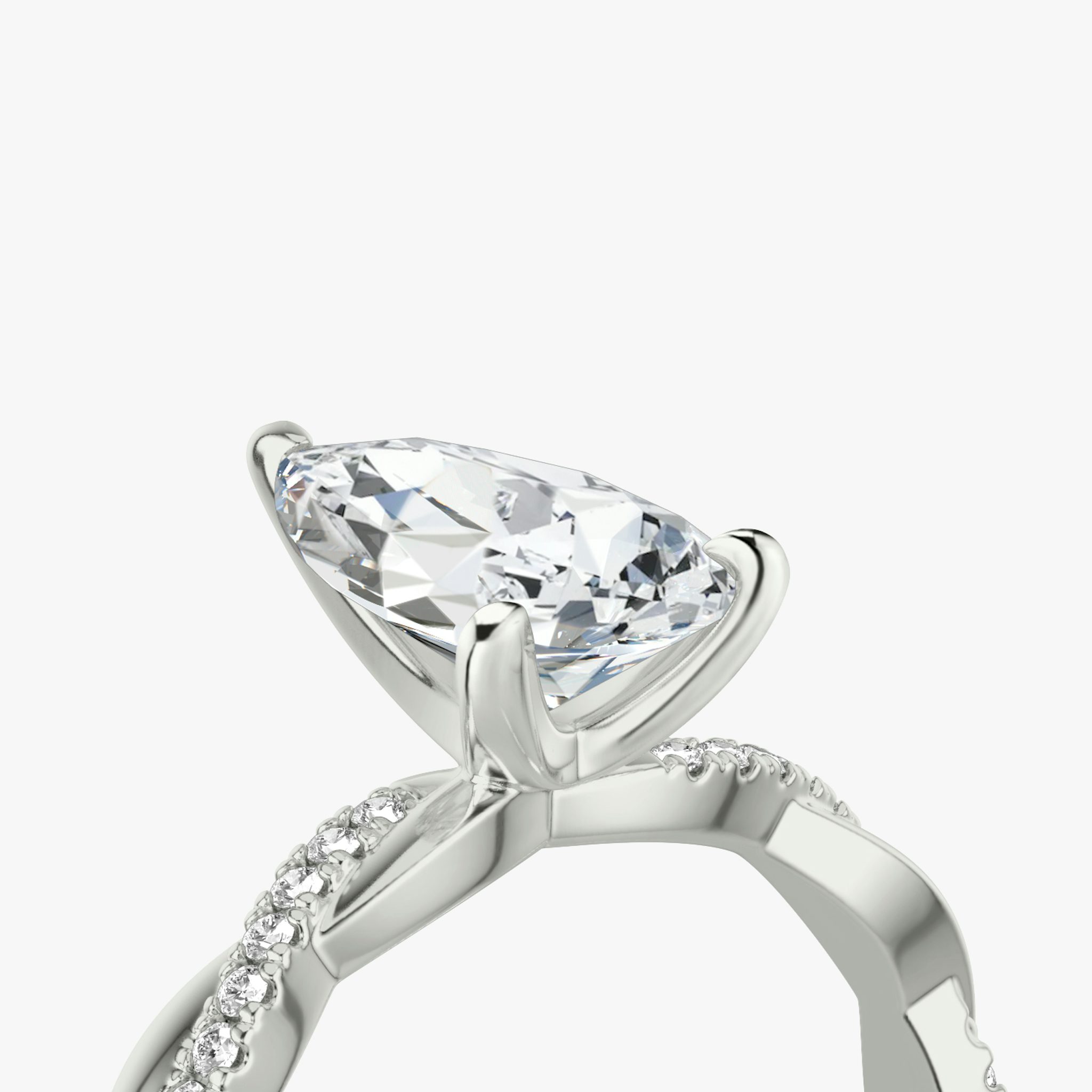 The Twisted Classic | Pear | Platinum | bandAccent: Pavé | diamondOrientation: vertical | caratWeight: other