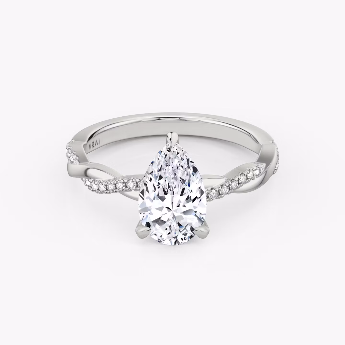 The Twisted Classic | Pear | 18k | White Gold | bandAccent: Pavé | diamondOrientation: vertical | caratWeight: other