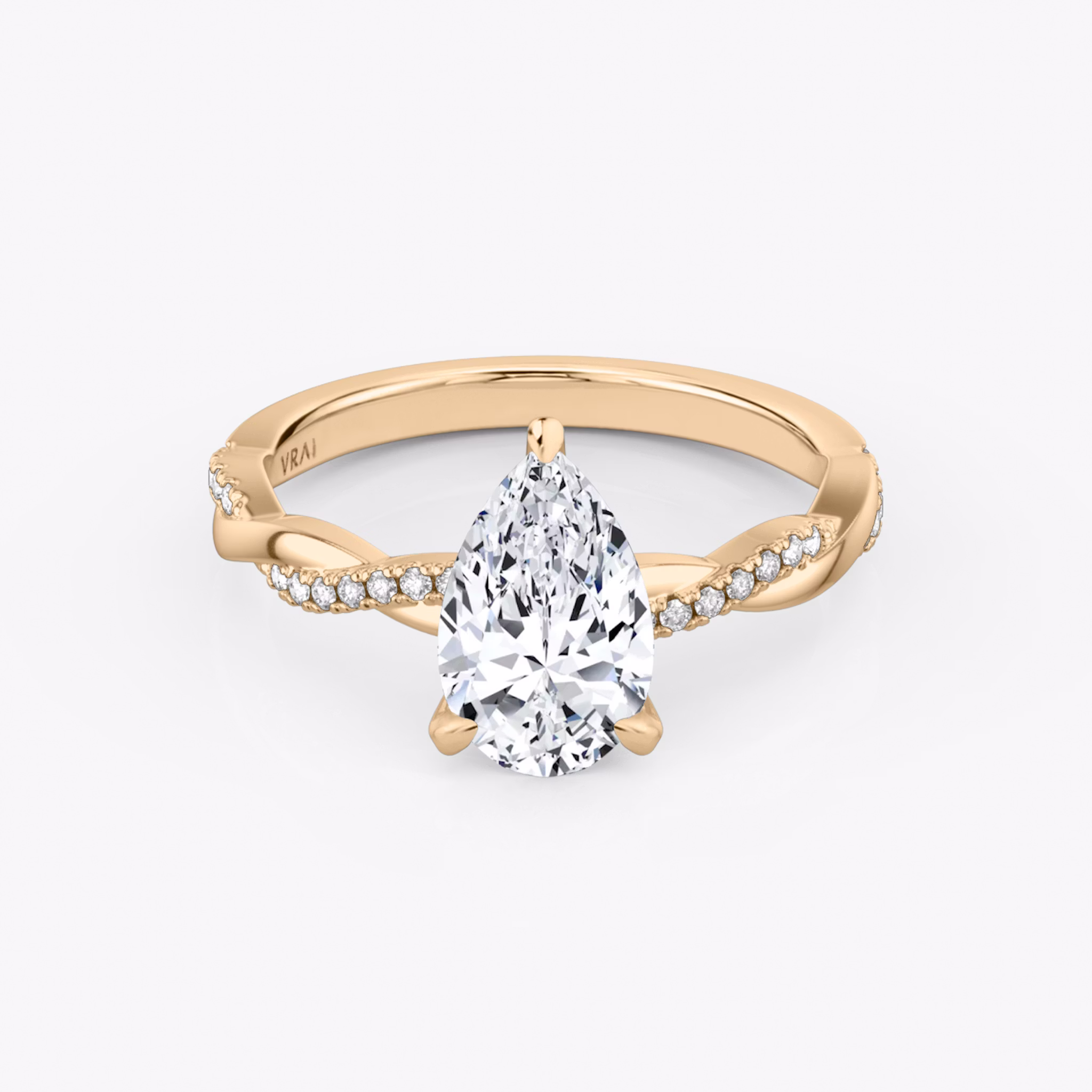The Twisted Classic | Pear | 14k | Rose Gold | bandAccent: Pavé | diamondOrientation: vertical | caratWeight: other