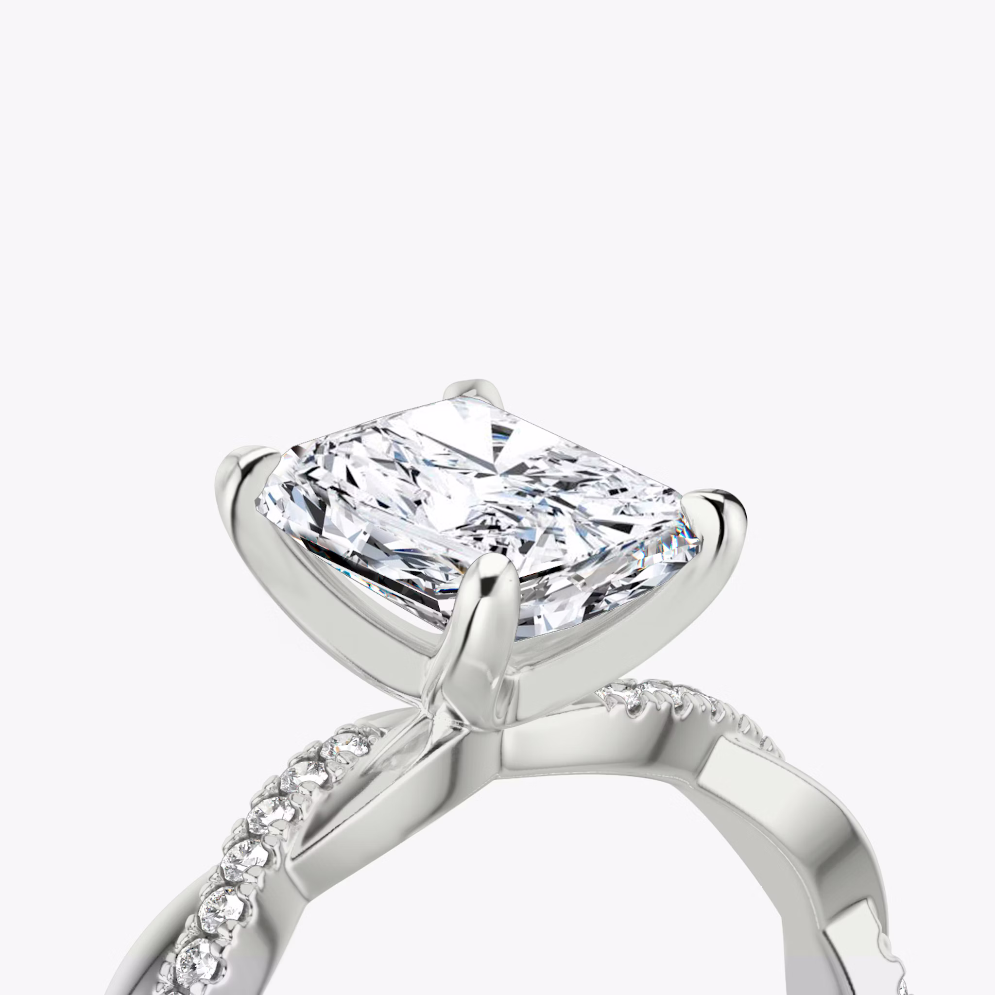 The Twisted Classic | Radiant | Platinum | bandAccent: Pavé | diamondOrientation: vertical | caratWeight: other