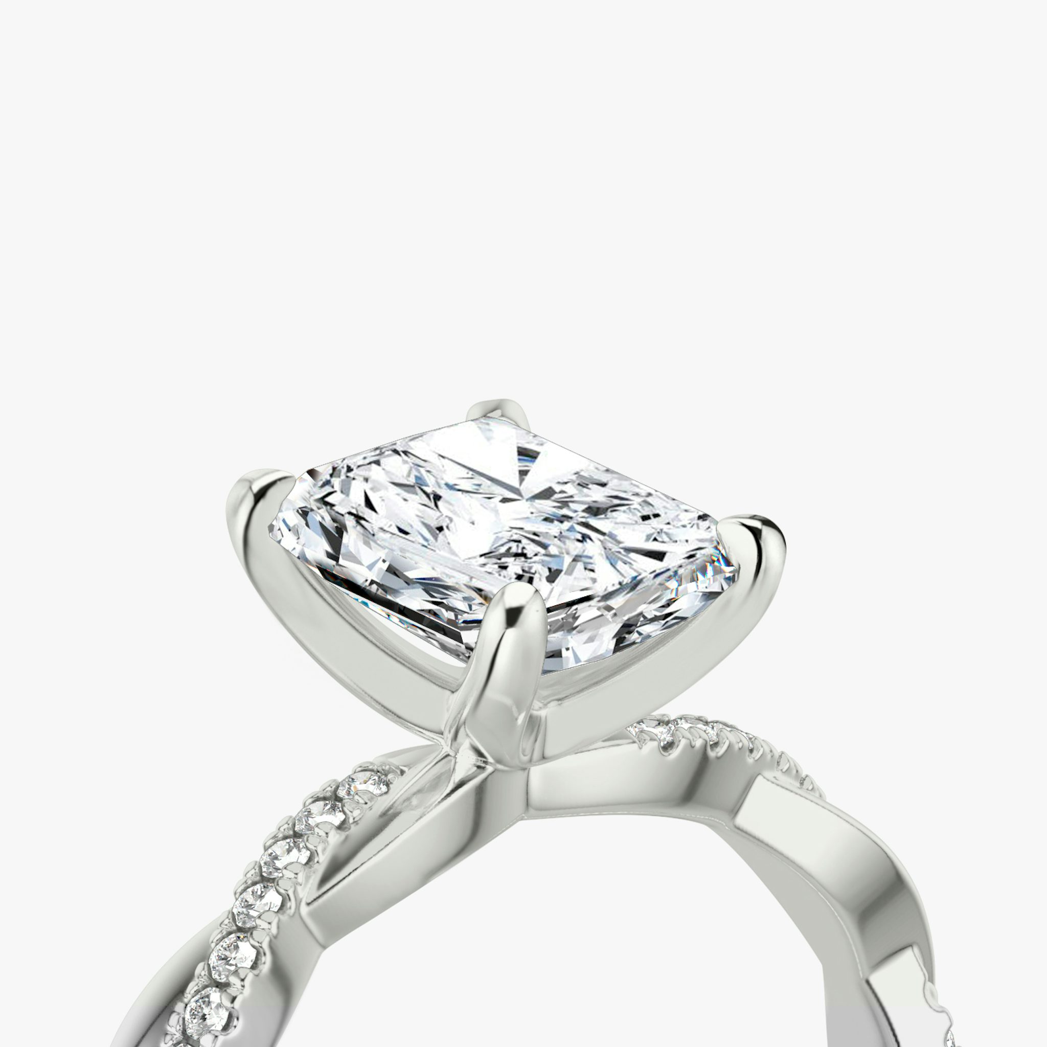 The Twisted Classic | Radiant | Platinum | bandAccent: Pavé | diamondOrientation: vertical | caratWeight: other