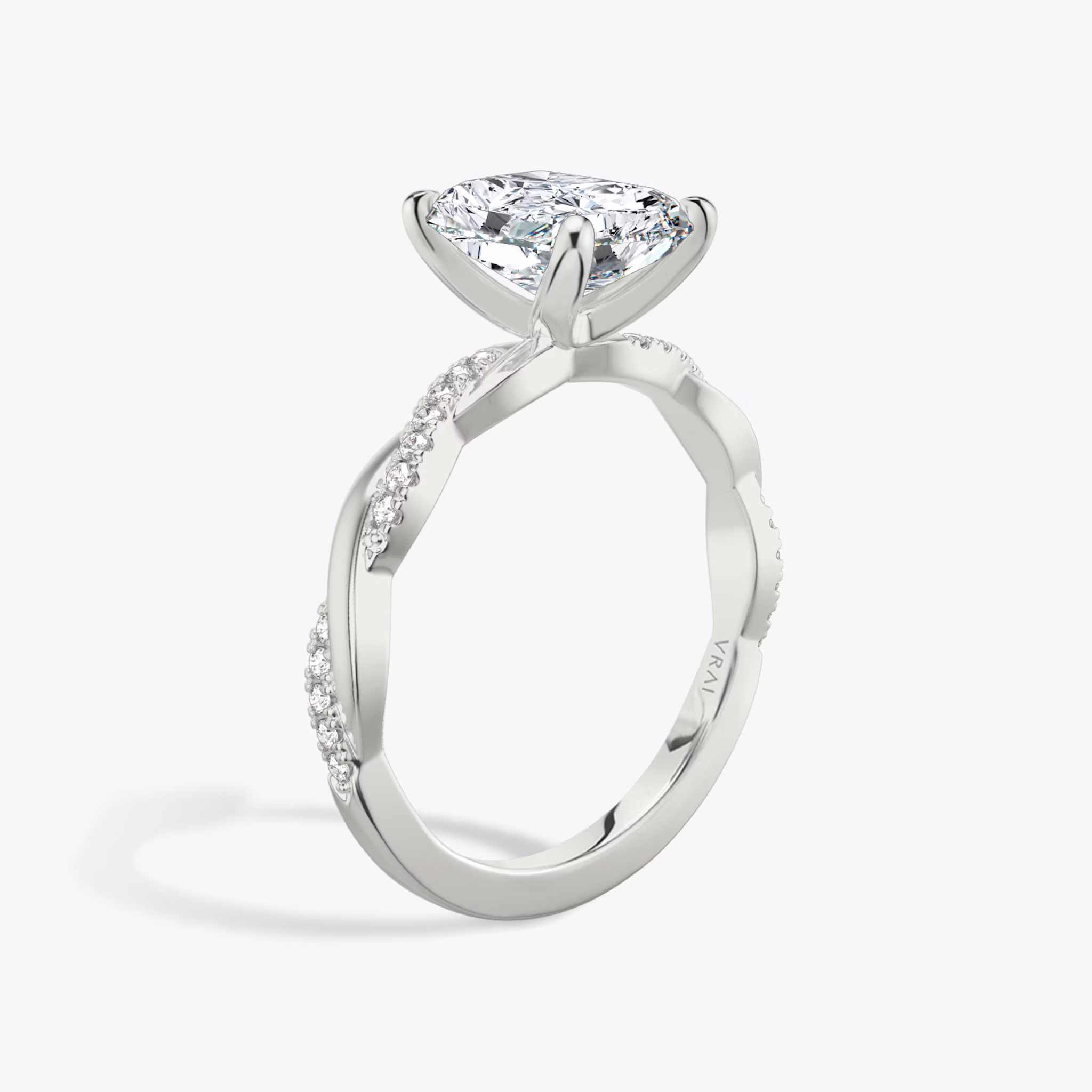 Radiant-cut diamond ring with pavé twisted platinum band, VRAI Twisted Classic setting.