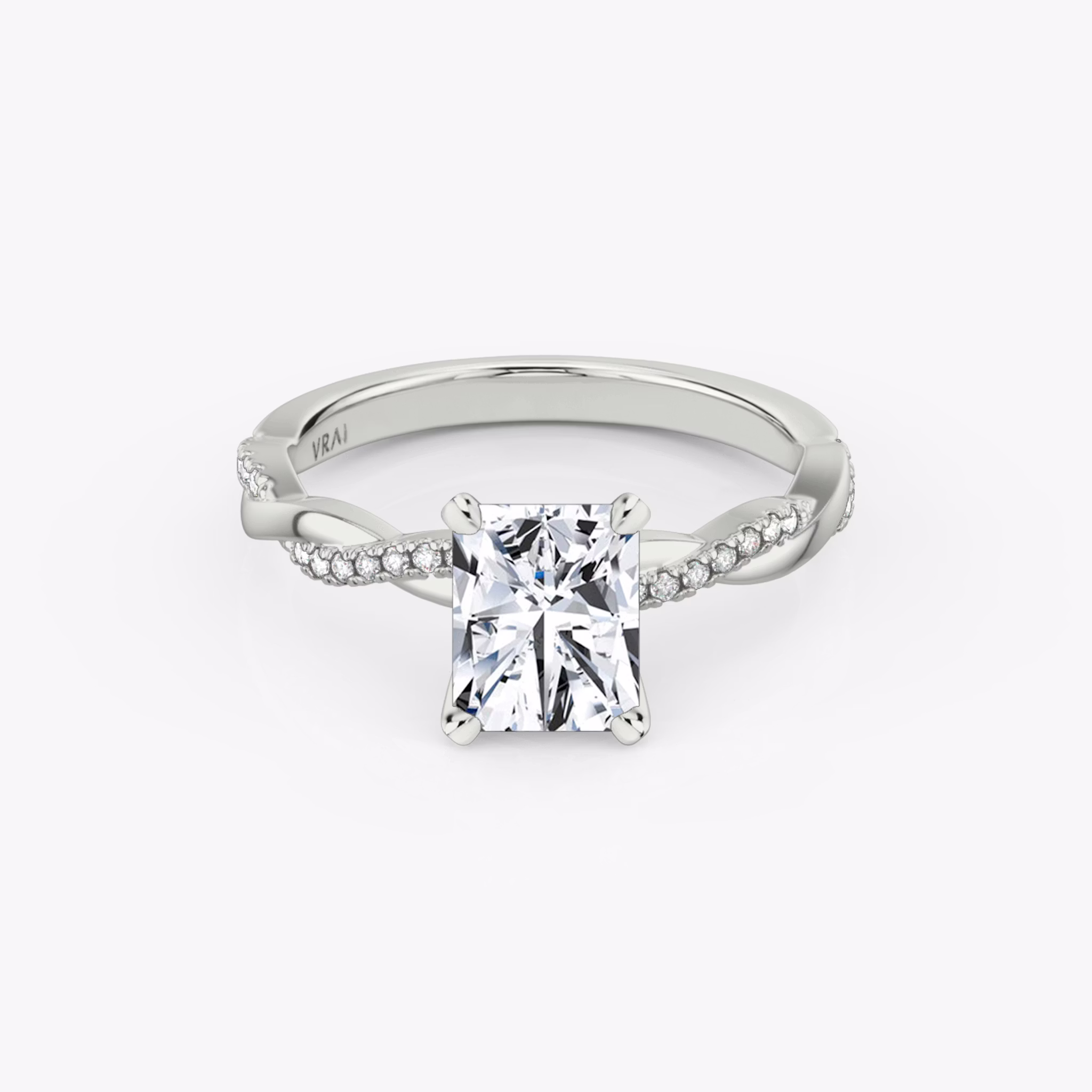 Radiant-cut diamond ring with pavé twisted platinum band, VRAI Twisted Classic setting.