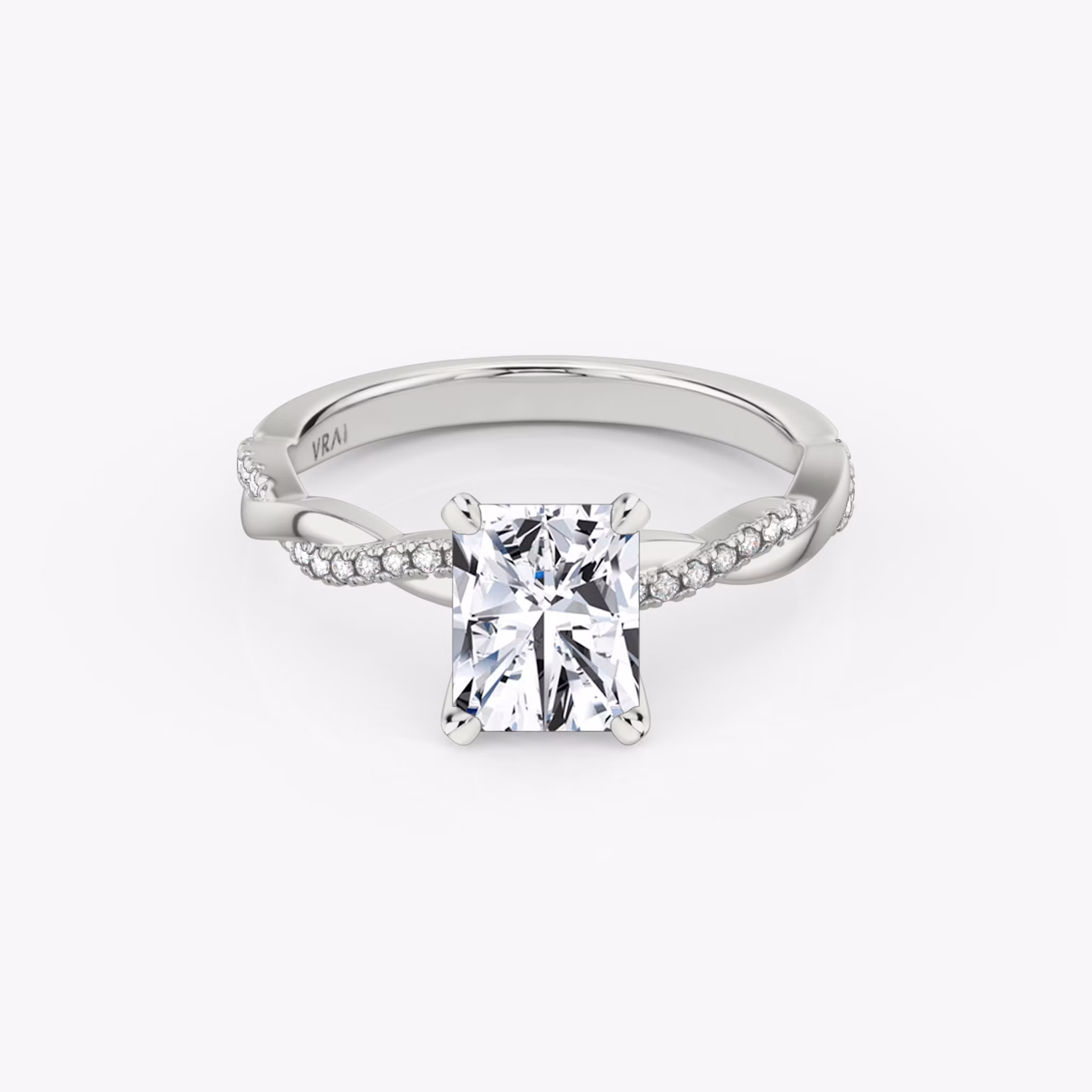 Radiant-cut diamond ring with pavé twisted platinum band, VRAI Twisted Classic setting.