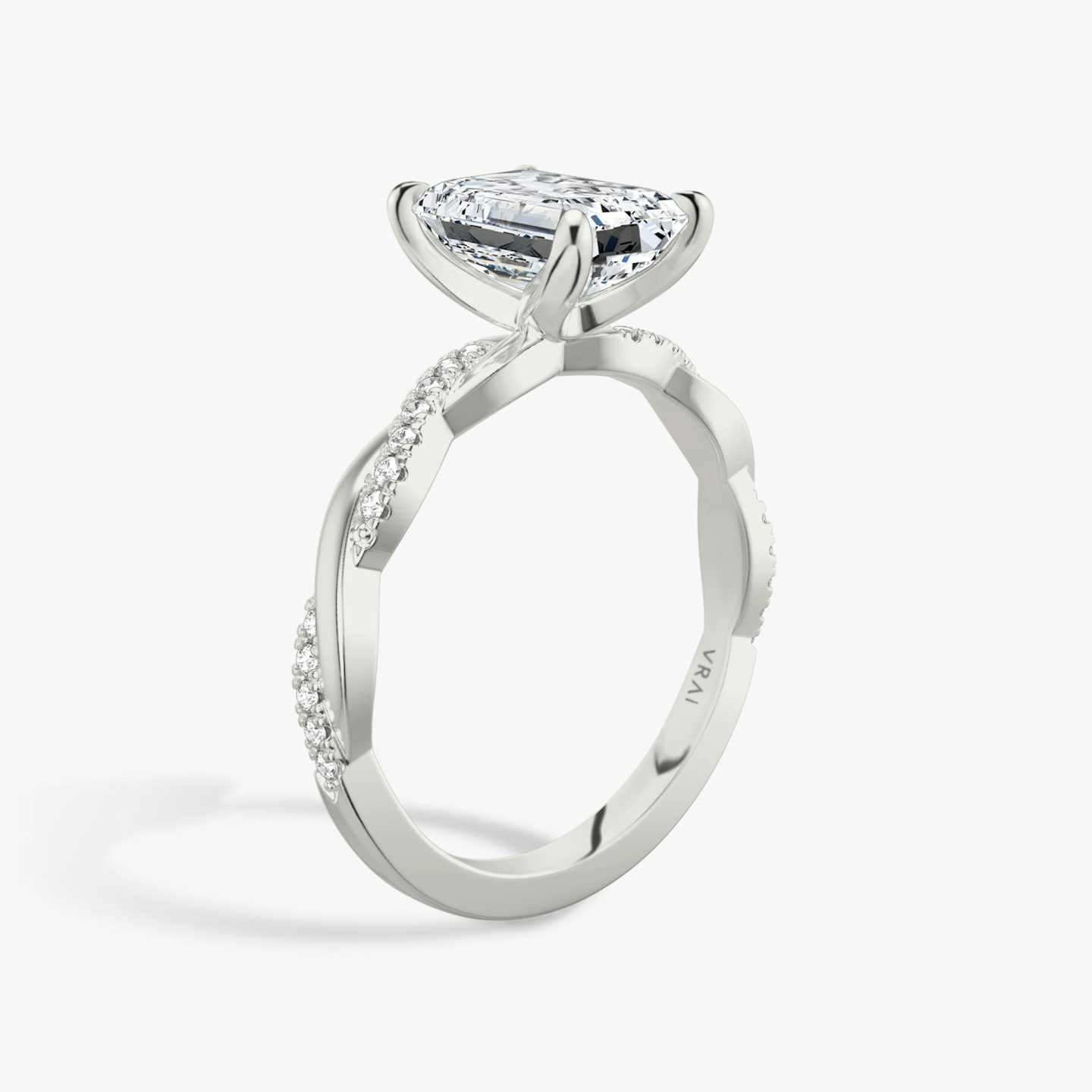The Twisted Classic | Emerald | Platinum | bandAccent: Pavé | diamondOrientation: vertical | caratWeight: other