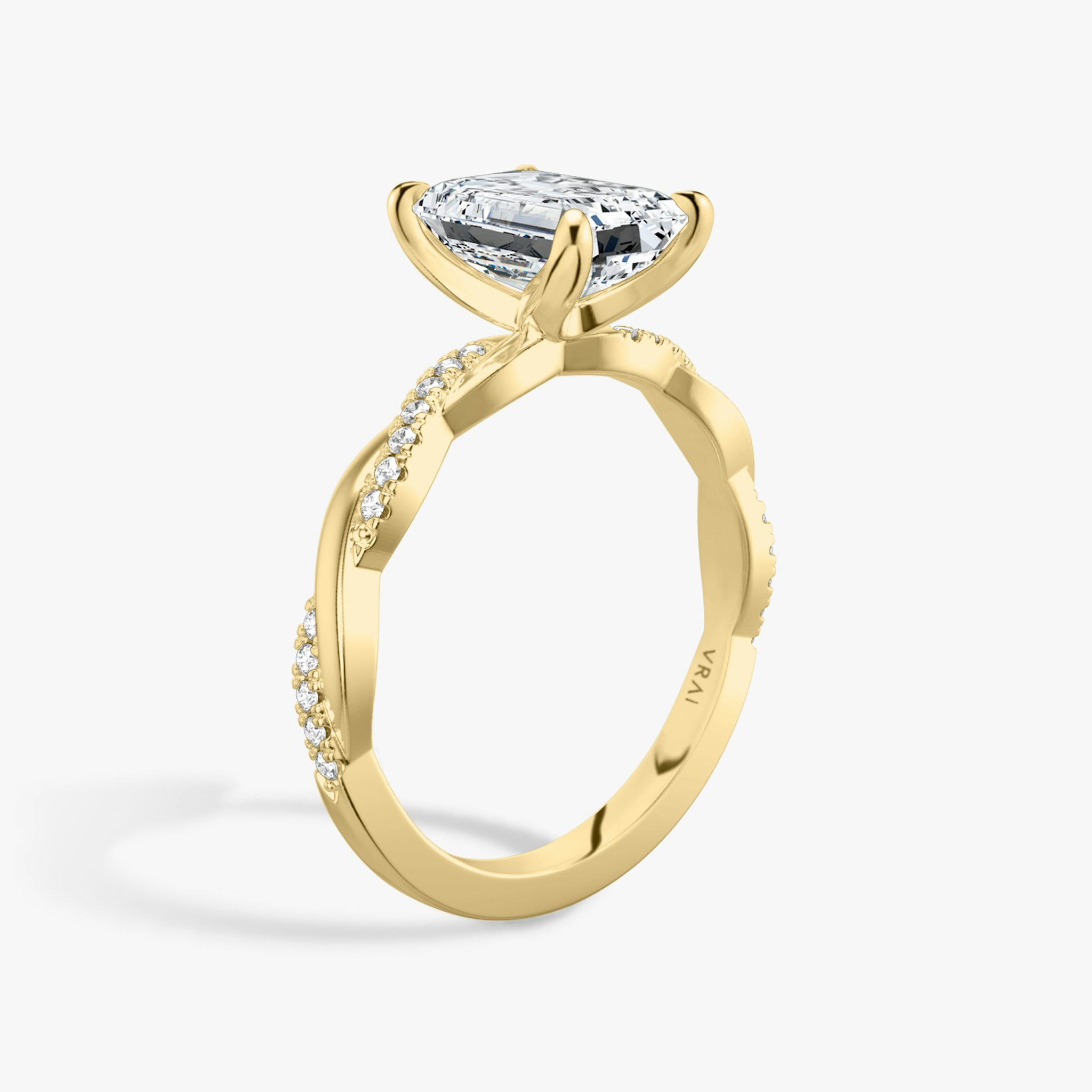The Twisted Classic | Emerald | 18k | Yellow Gold | bandAccent: Pavé | diamondOrientation: vertical | caratWeight: other