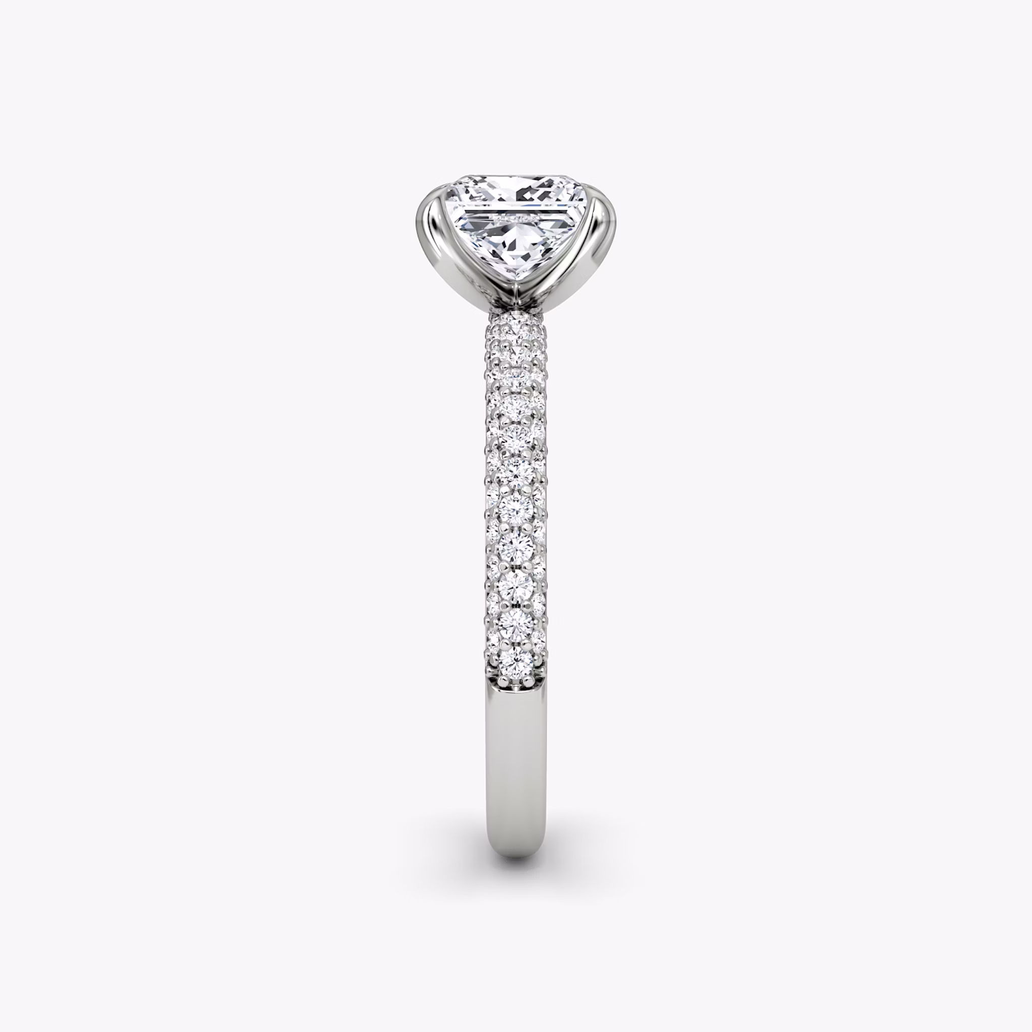side view of three-row dome engagement ring princess cut in pave white gold