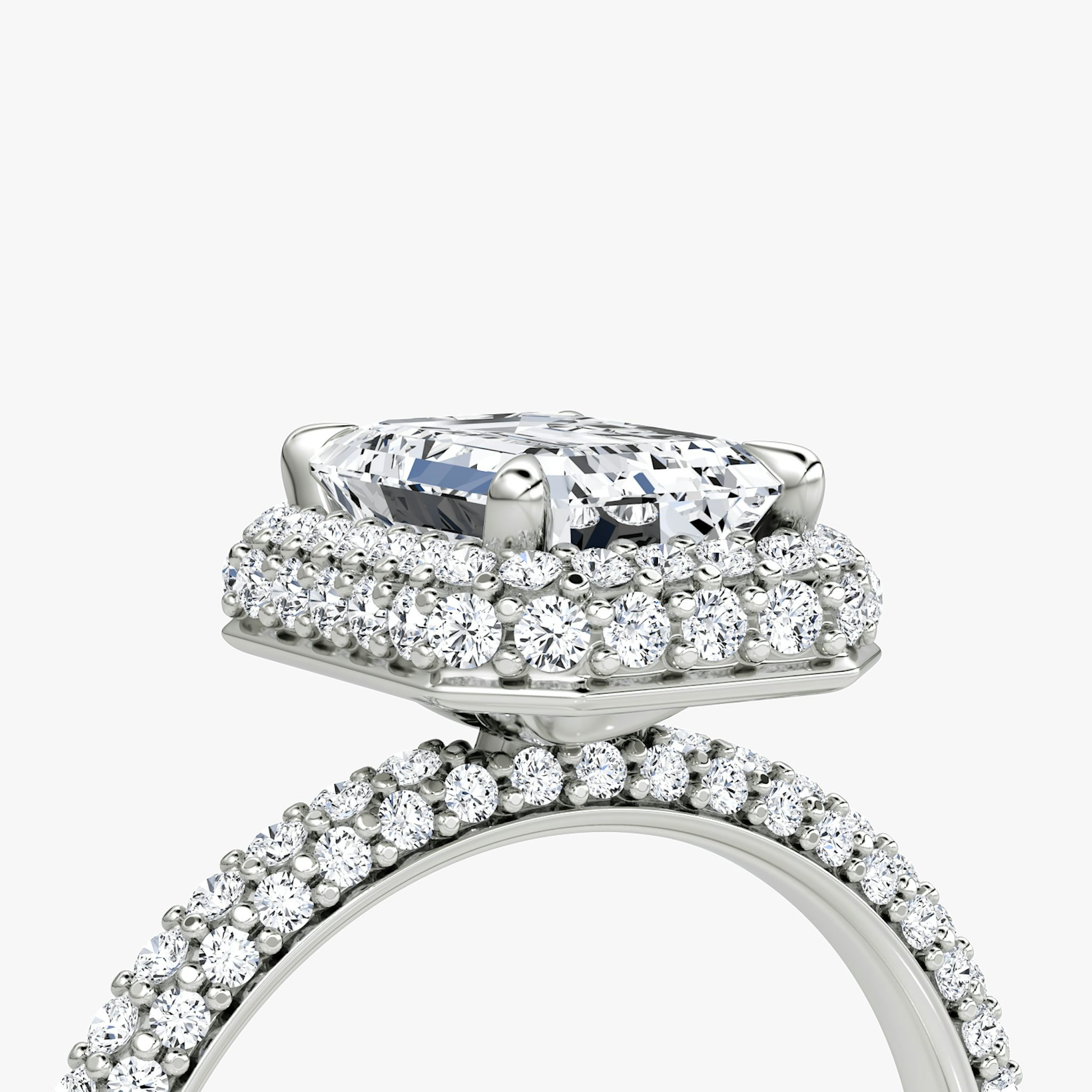 The Halo Dome | Emerald | Platinum | bandAccent: Pavé | diamondOrientation: vertical | caratWeight: other