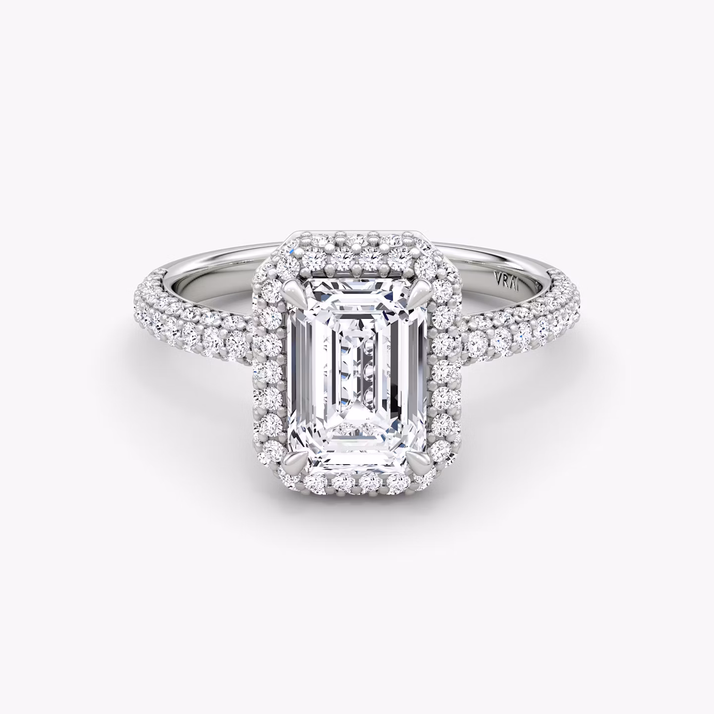 The Halo Dome | Emerald | Platinum | bandAccent: Pavé | diamondOrientation: vertical | caratWeight: other