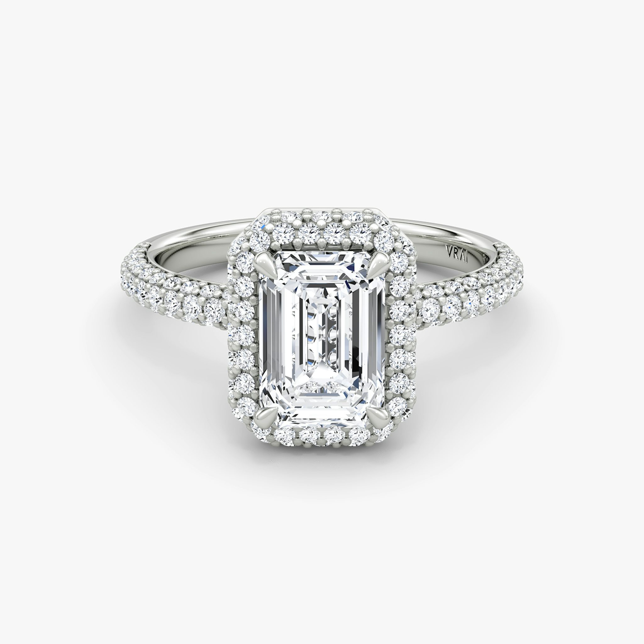The Halo Dome | Emerald | Platinum | bandAccent: Pavé | diamondOrientation: vertical | caratWeight: other