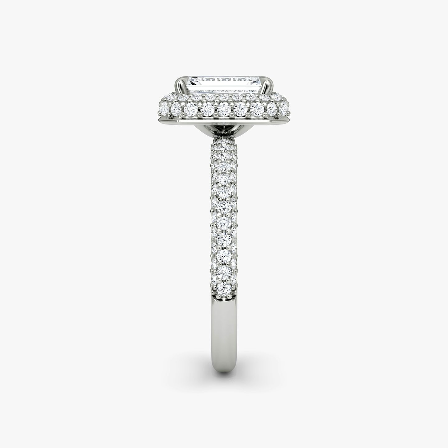 The Halo Dome | Emerald | Platinum | bandAccent: Pavé | diamondOrientation: vertical | caratWeight: other