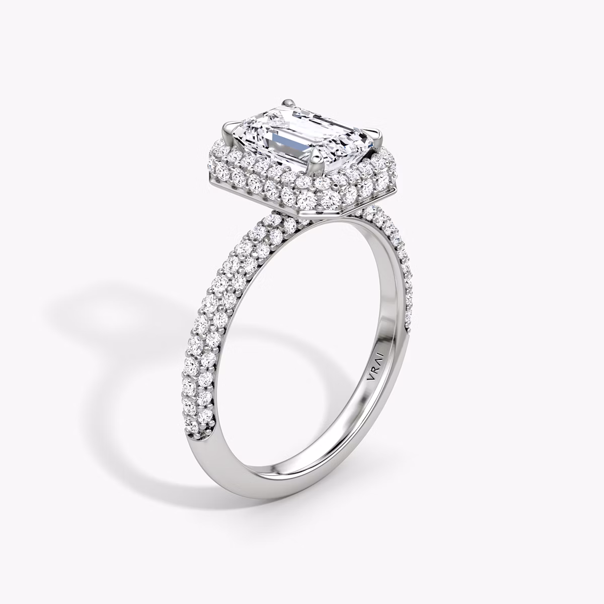The Halo Dome | Emerald | 18k | White Gold | bandAccent: Pavé | diamondOrientation: vertical | caratWeight: other
