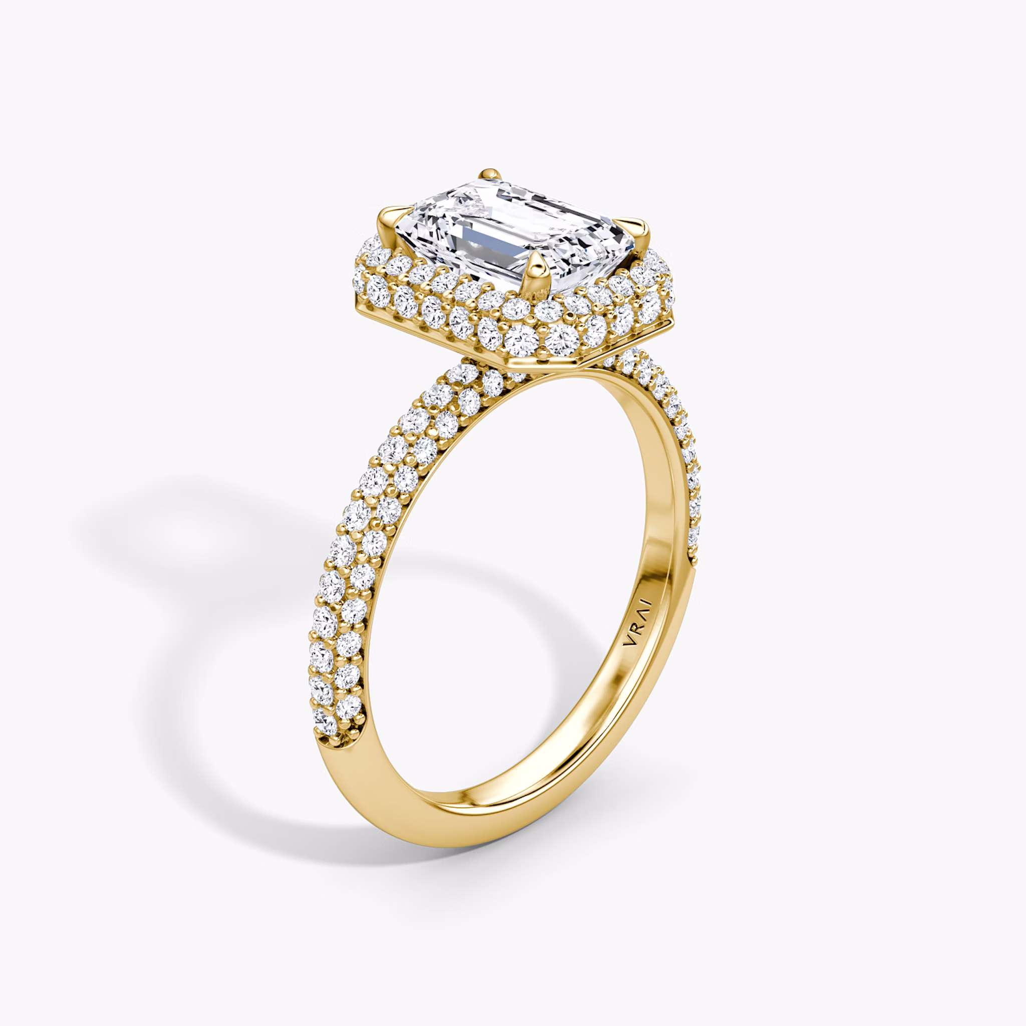 The Halo Dome | Emerald | 18k | Yellow Gold | bandAccent: Pavé | diamondOrientation: vertical | caratWeight: other