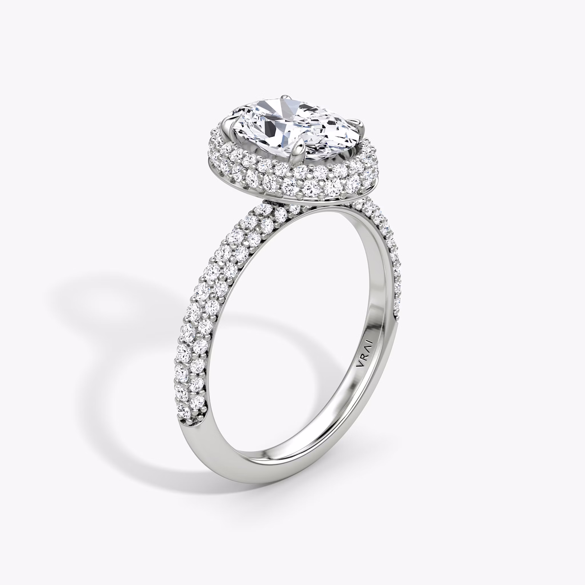 The Halo Dome | Oval | Platinum | bandAccent: Pavé | diamondOrientation: vertical | caratWeight: other